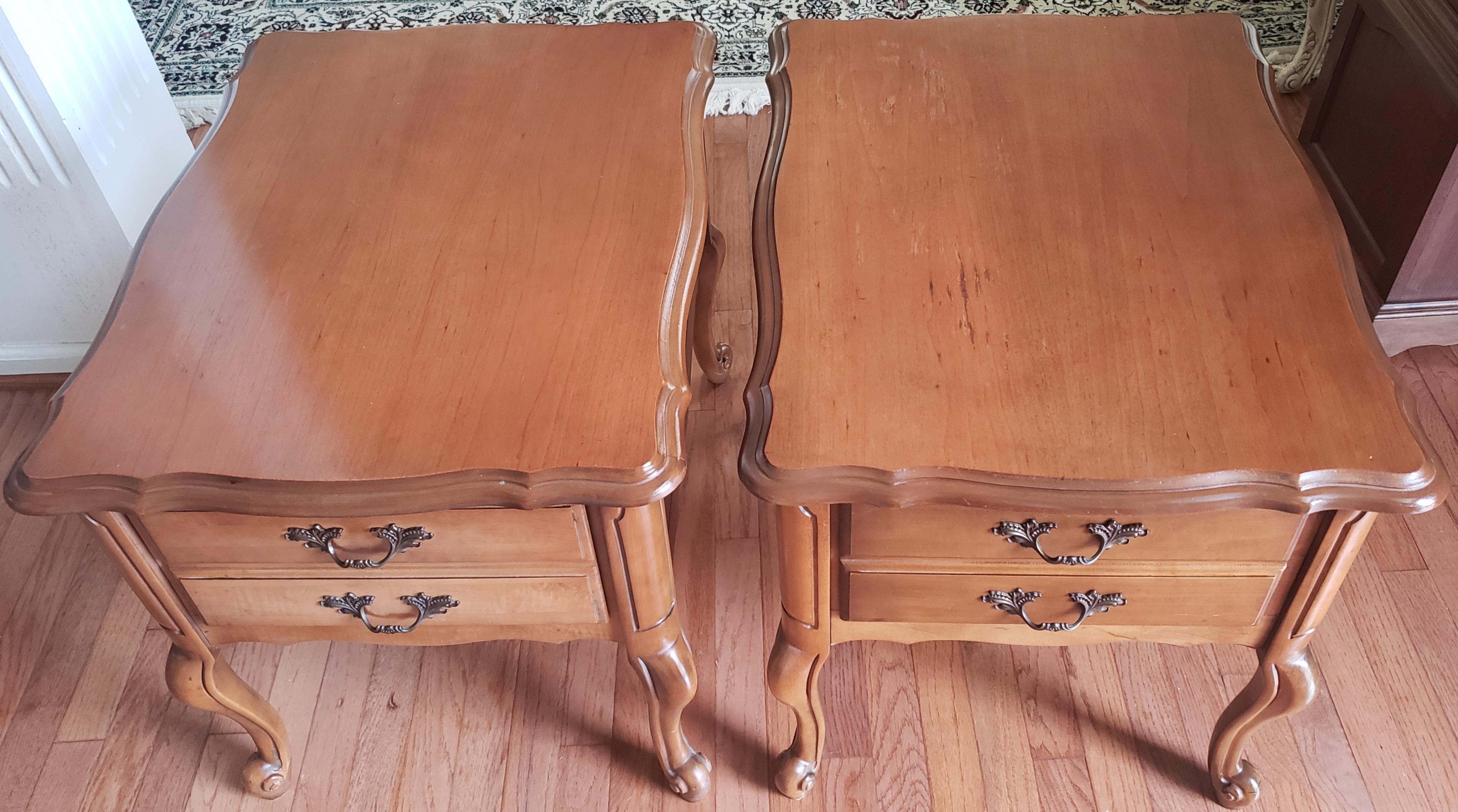 Pair of 1960s French provincial side table in solid maple. Original hardware. Plenty of storage in single Large drawer. Cabriol legs. Good vintage condition.
Measures 21
