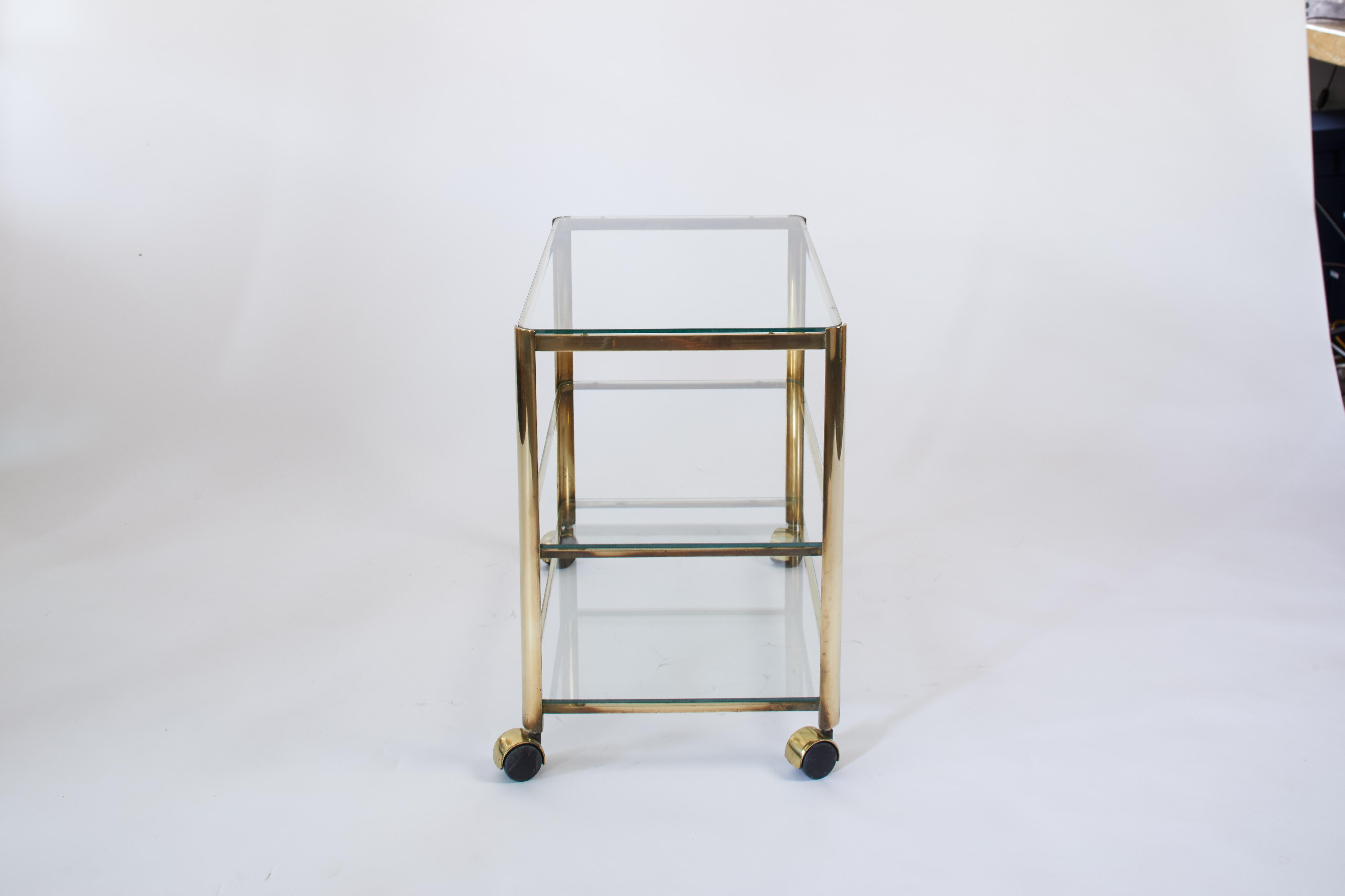 1960s French quinet bronze and smoked glass bar cart.
