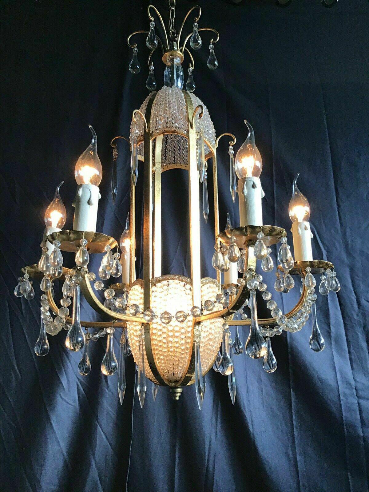 This 1960's French Regency style Cut Crystal Beaded Chandelier is in a 