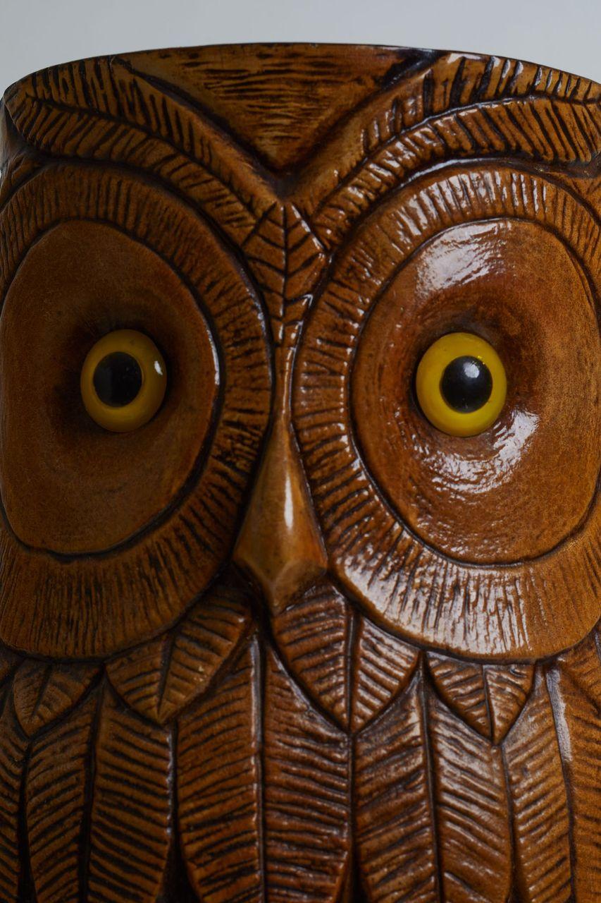 1960s French resin umbrella stand with brown owl design and yellow eye detail.