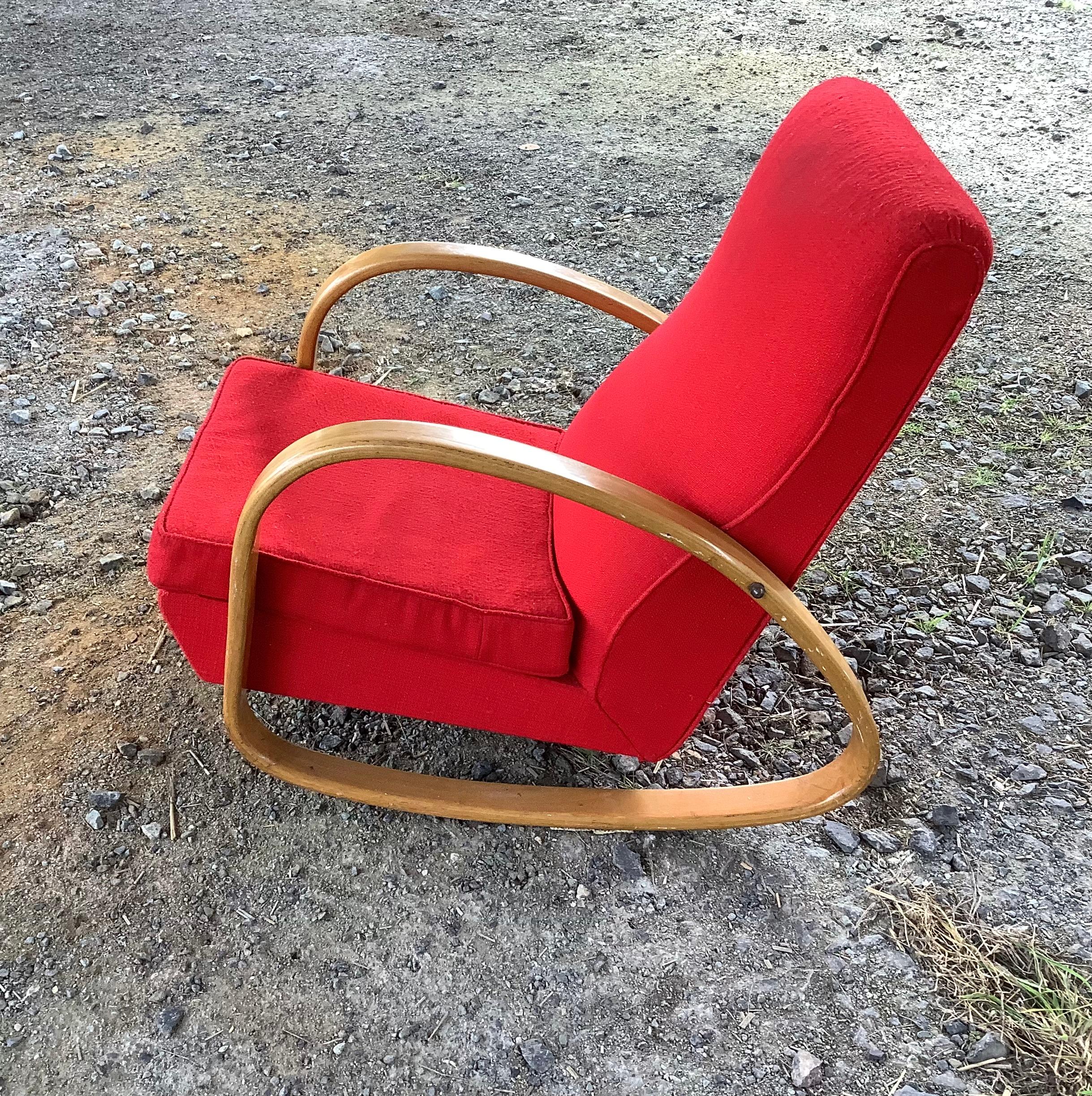 Well crafted rocking chair with steamed bent wooden arms