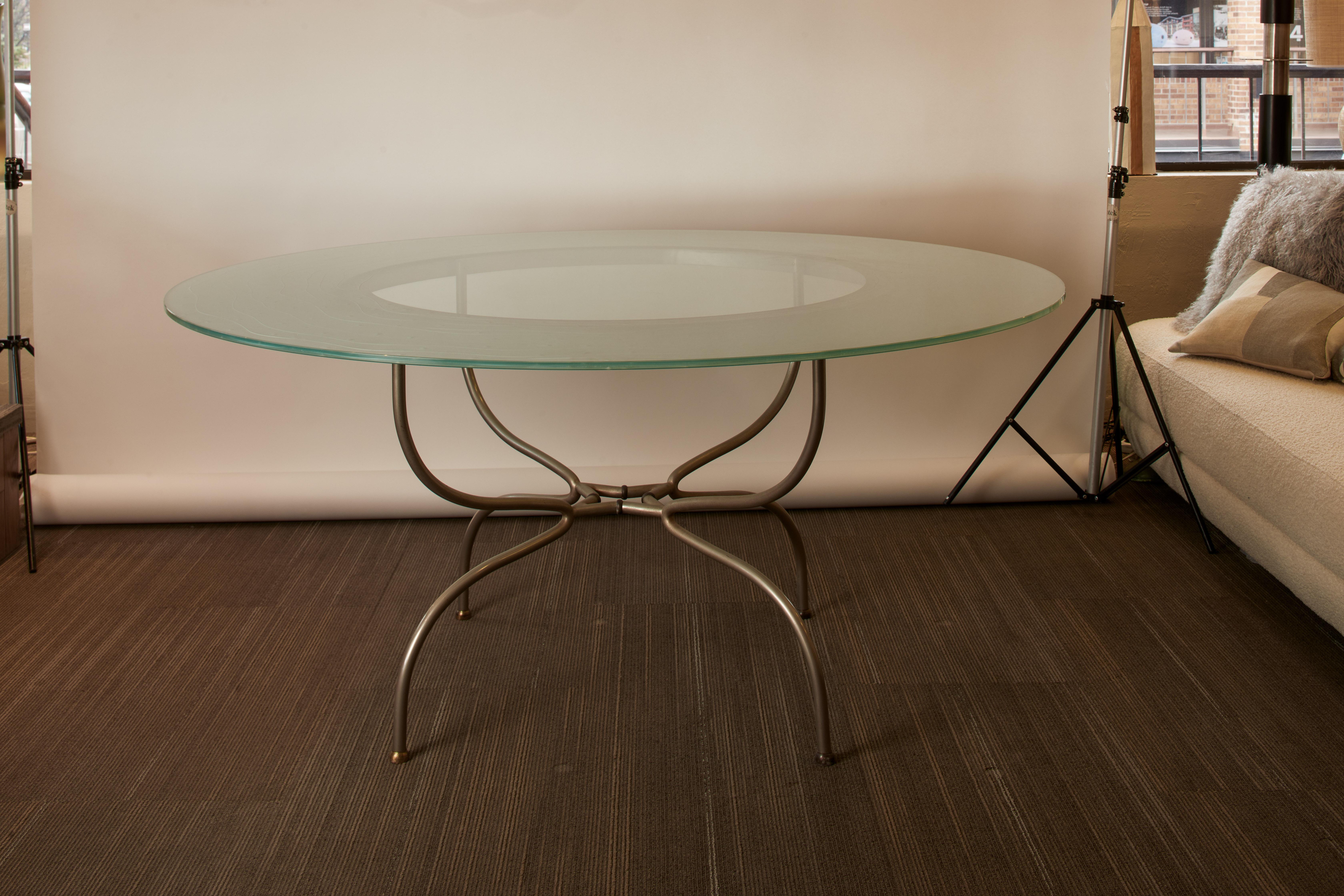 1960s French seaglass color etched glass round table top with chrome legs. Clear circular glass center. Undulating etched lines across the outer rim.