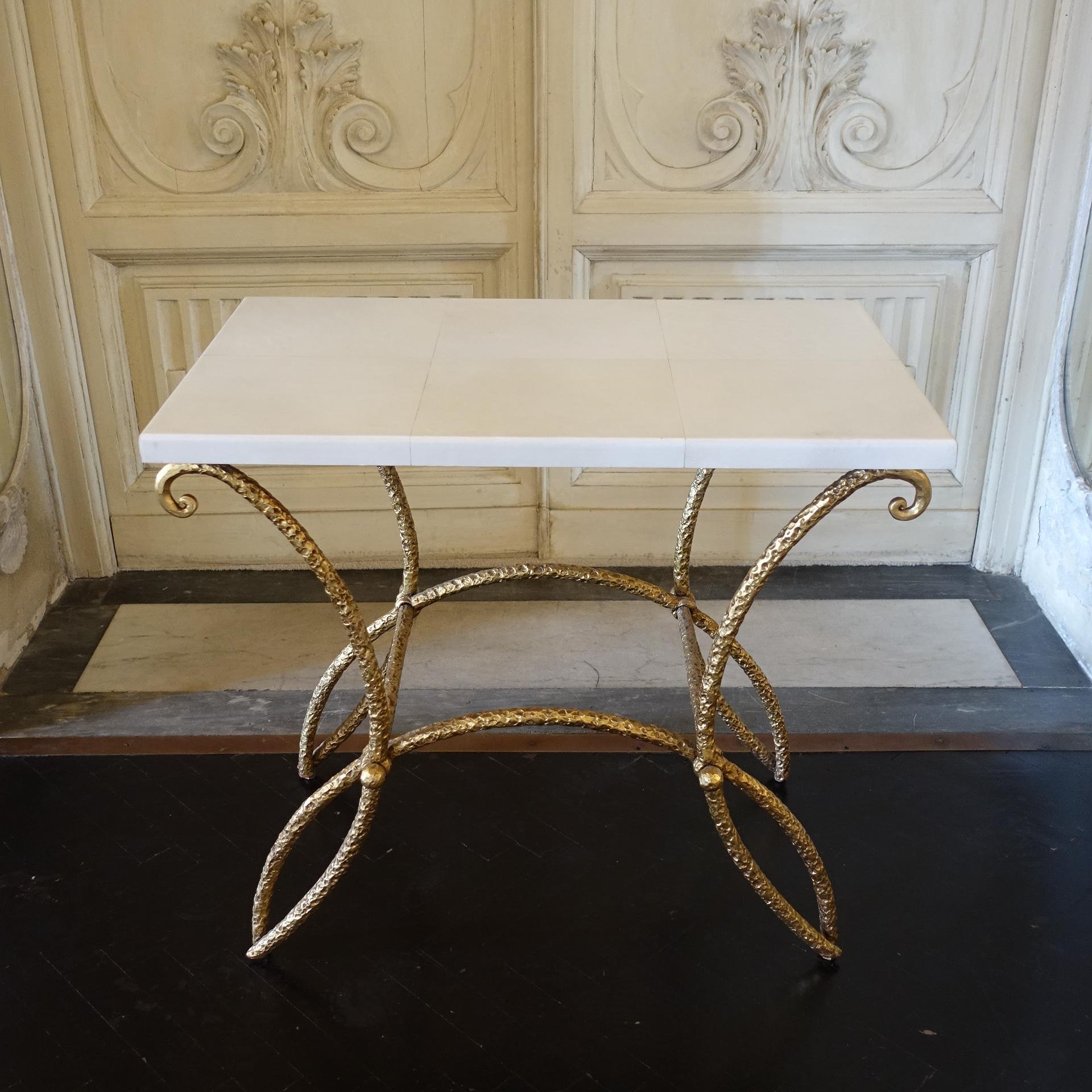 One of a kind side table with gilded fer forgé base and parchment top, beautiful vintage patina France 1960s circa.