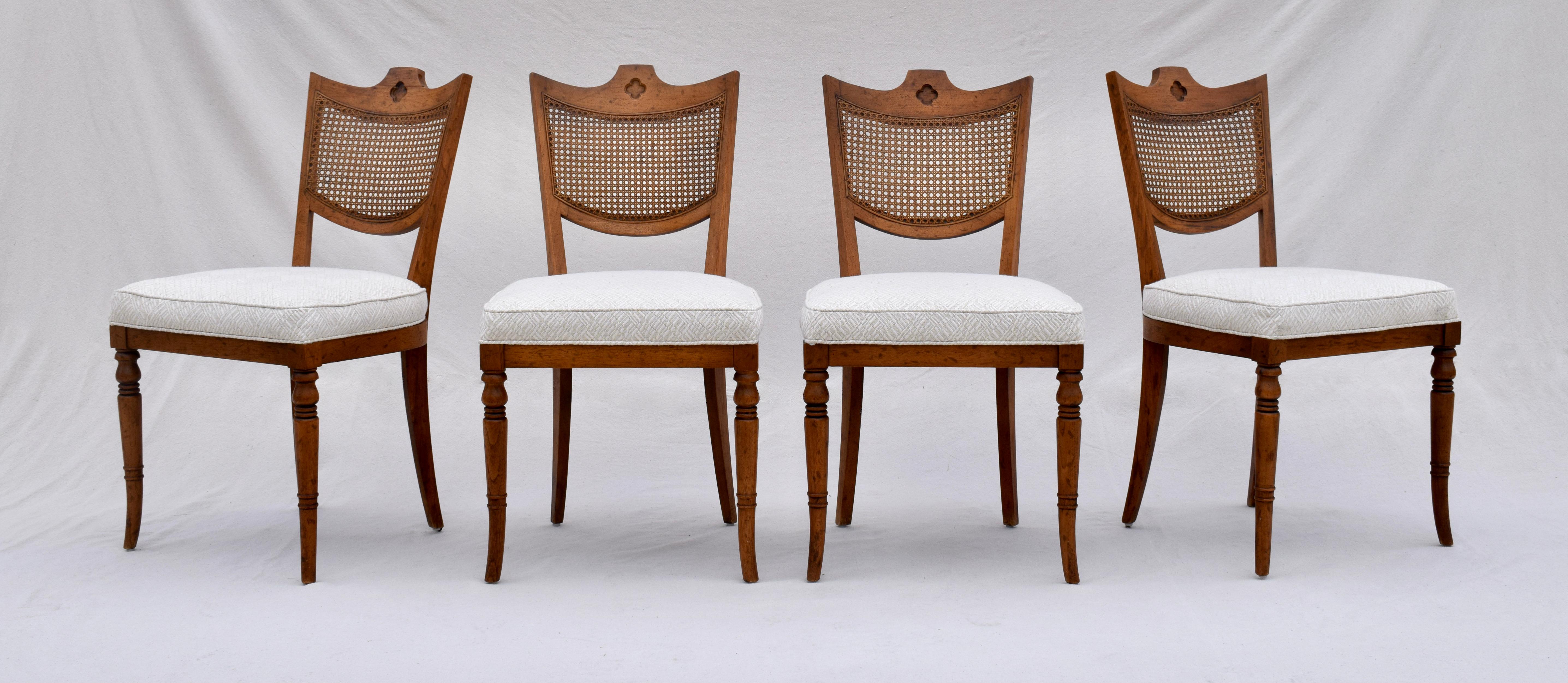 Classic mid century French style faux bamboo game table & four caned shield back chairs by Heritage Furniture. Exquisite lithe lines in the splayed legs design, chairs having new seats in vintage, new stock Brunschwig & Fils woven upholstery. Chair