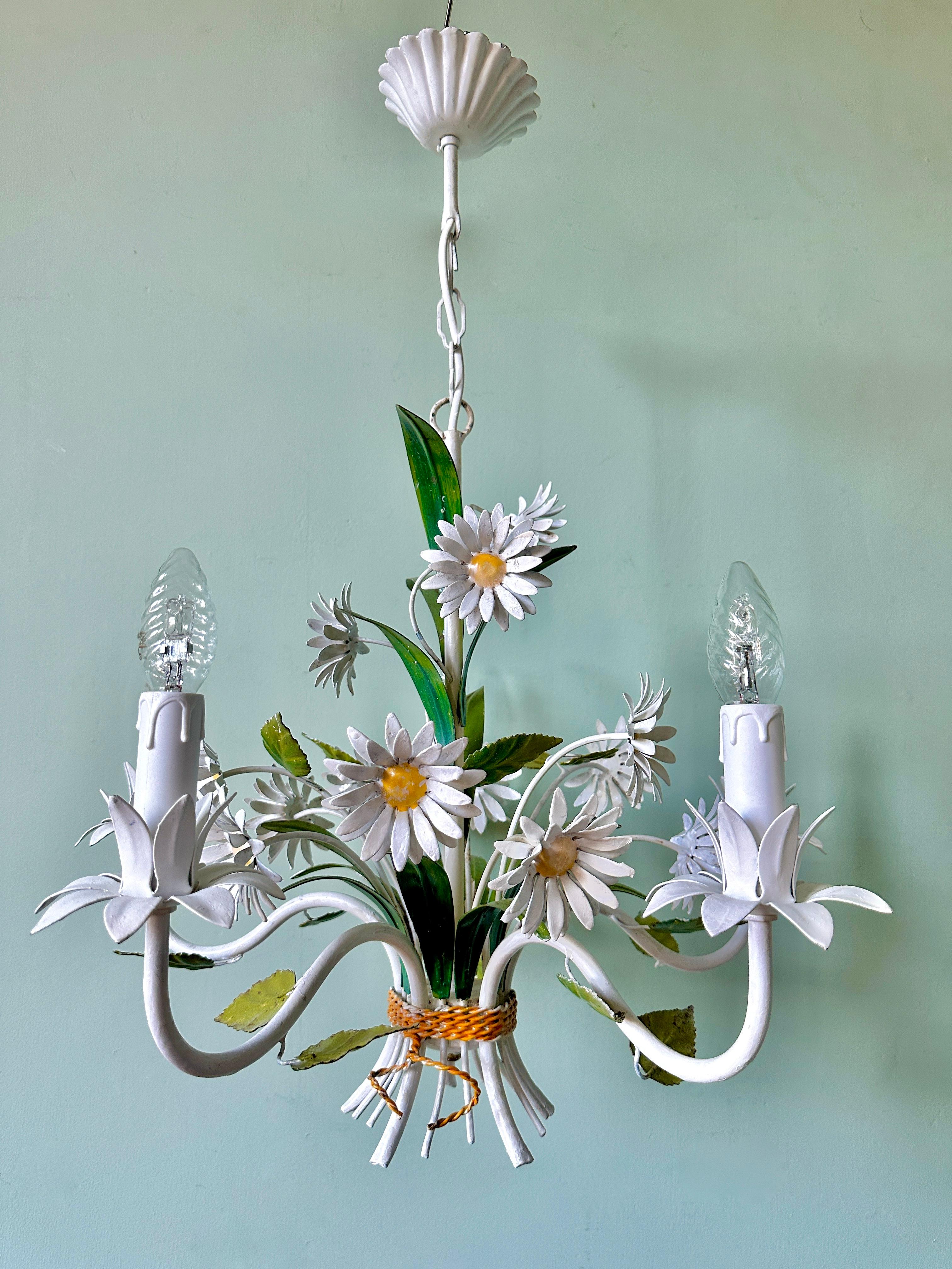 1960s French tole daisy chandelier.

A very lovely, hand-painted, five-arm ceiling light with scalloped ceiling rose. In very good condition with light and attractive wear. The chandelier has been rewired, fitted with new bulb holders & sleeves and