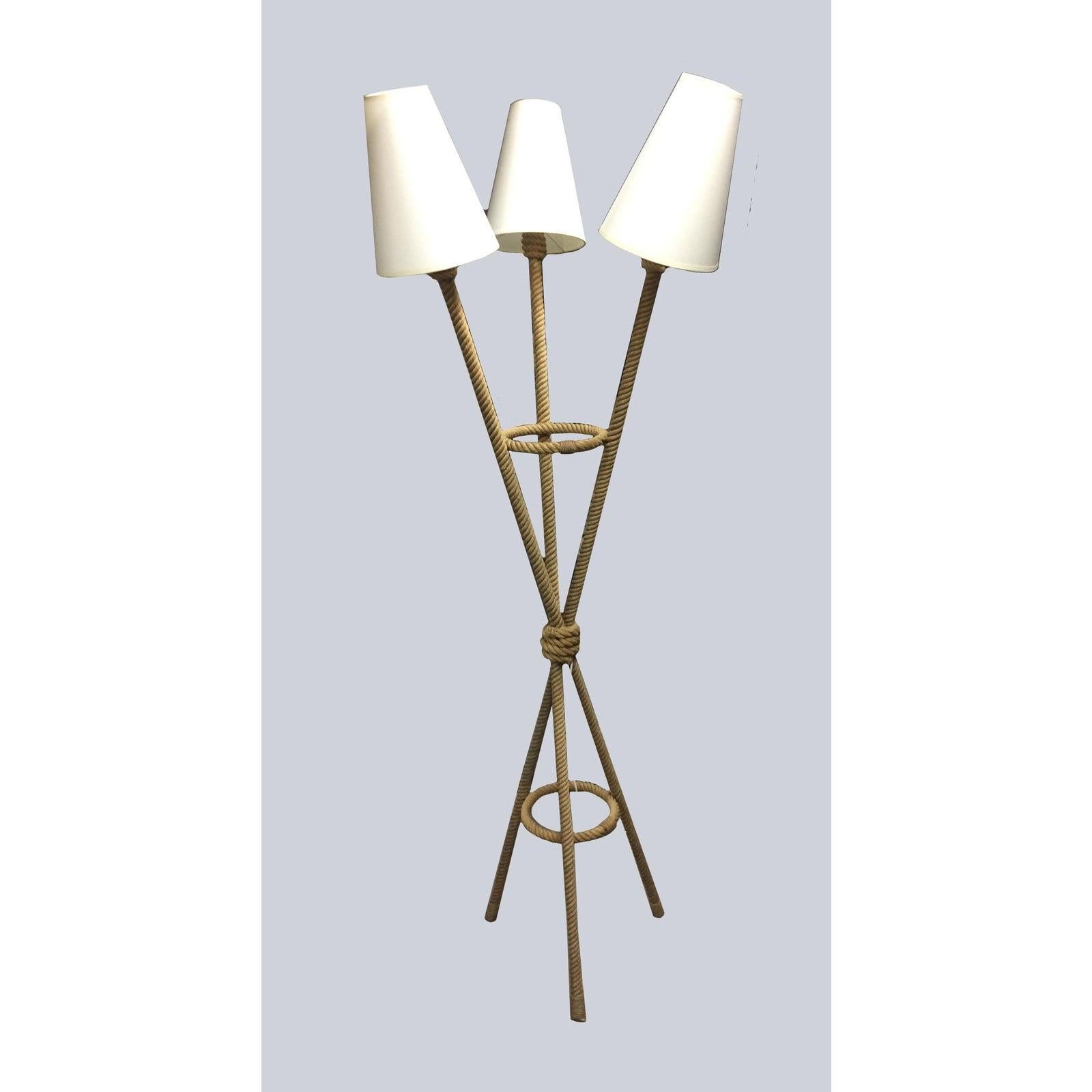 A delicate rope tripod base floor lamp with three shades, circa 1960s, France.