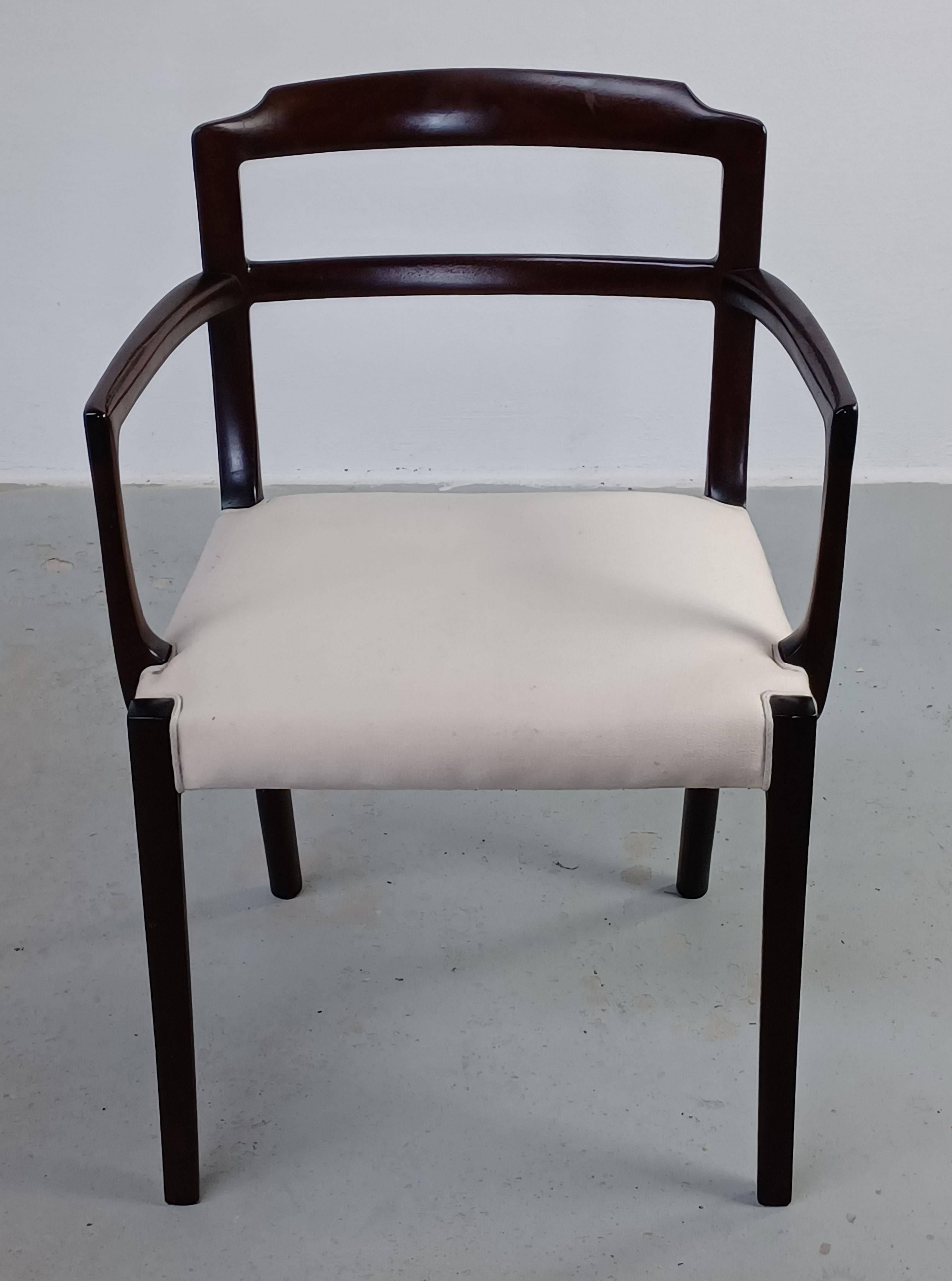1960's Fully Restored Danish Ole Wanscher Mahogany Arm Chair Custom Upholstery

The chair feature a well well designed and well crafted elegant mid-century modern armchair with Ole Wanschers well developed sense of organic shapes and proportions and
