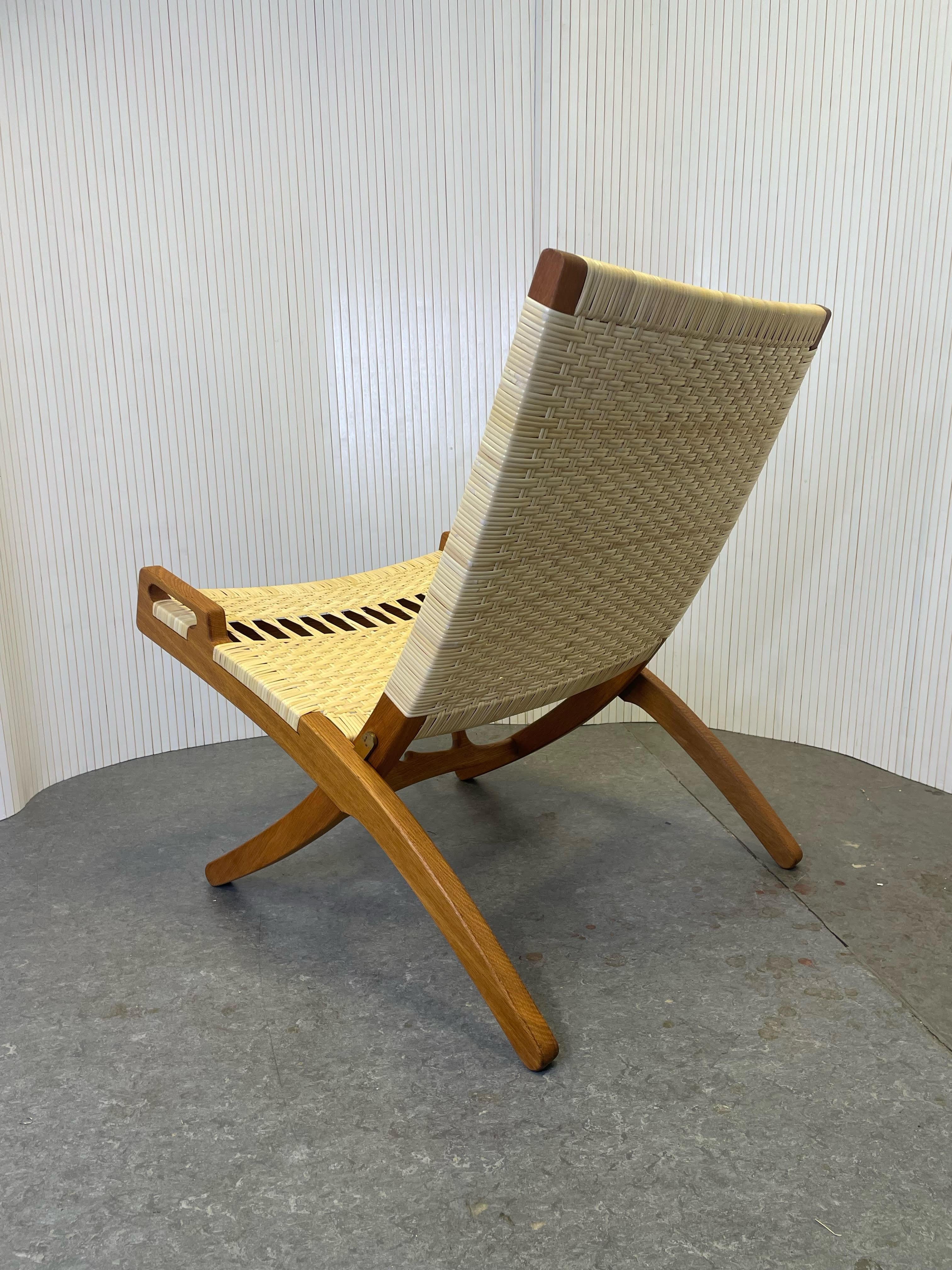 Chaise pliante Hans J. Wegner modèle JH 512 des années 1960 entièrement restaurée, rotin et rotin neufs Bon état - En vente à Knebel, DK
