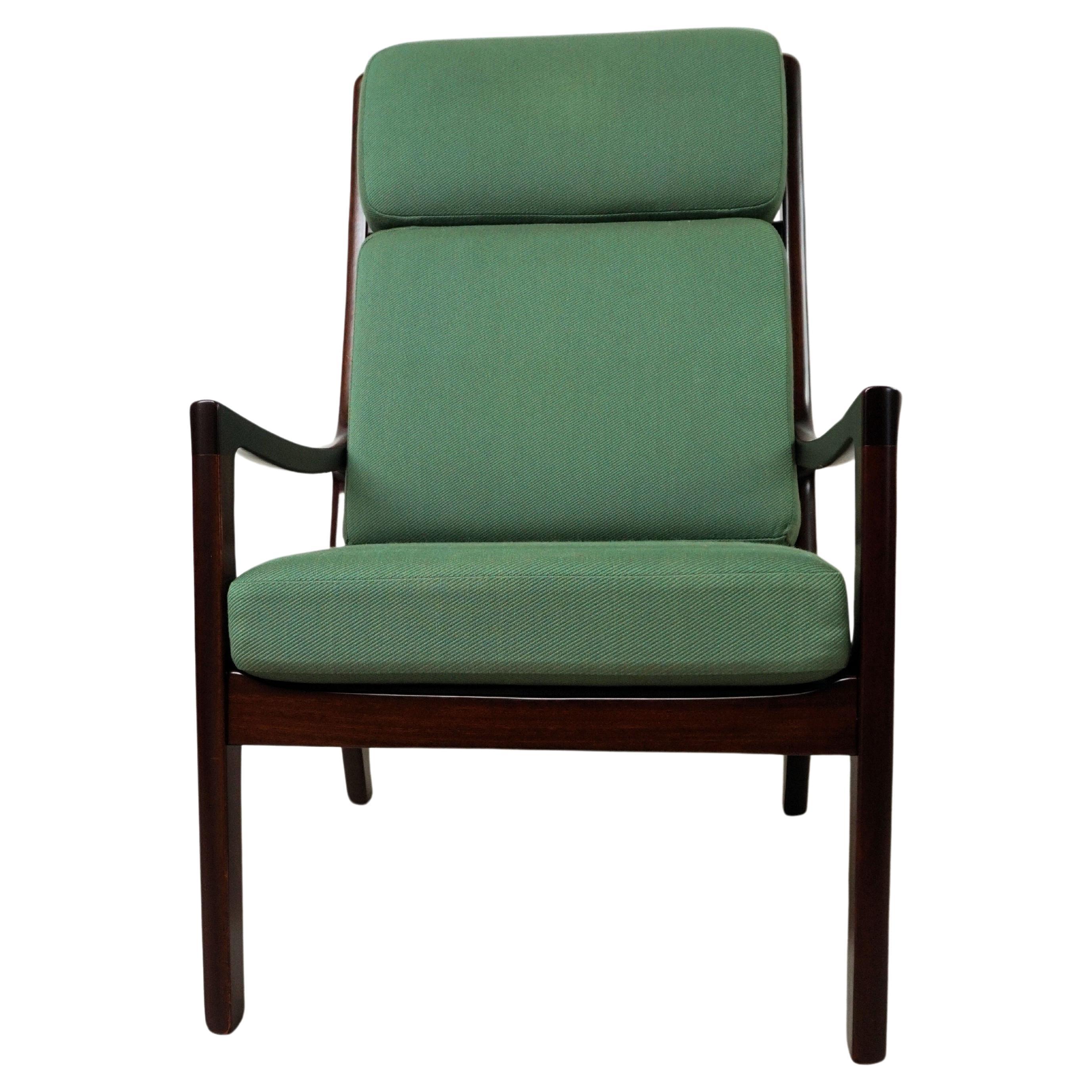 
1960s fully restored Ole Wanscher mahogany lounge chair custom reupholstery 

Elegant shaped Danish Ole Wanscher lounge chair designed by Ole Wanscher in the 1950's.
The well made lounge chair has been fully restored and refinished by our inhouse