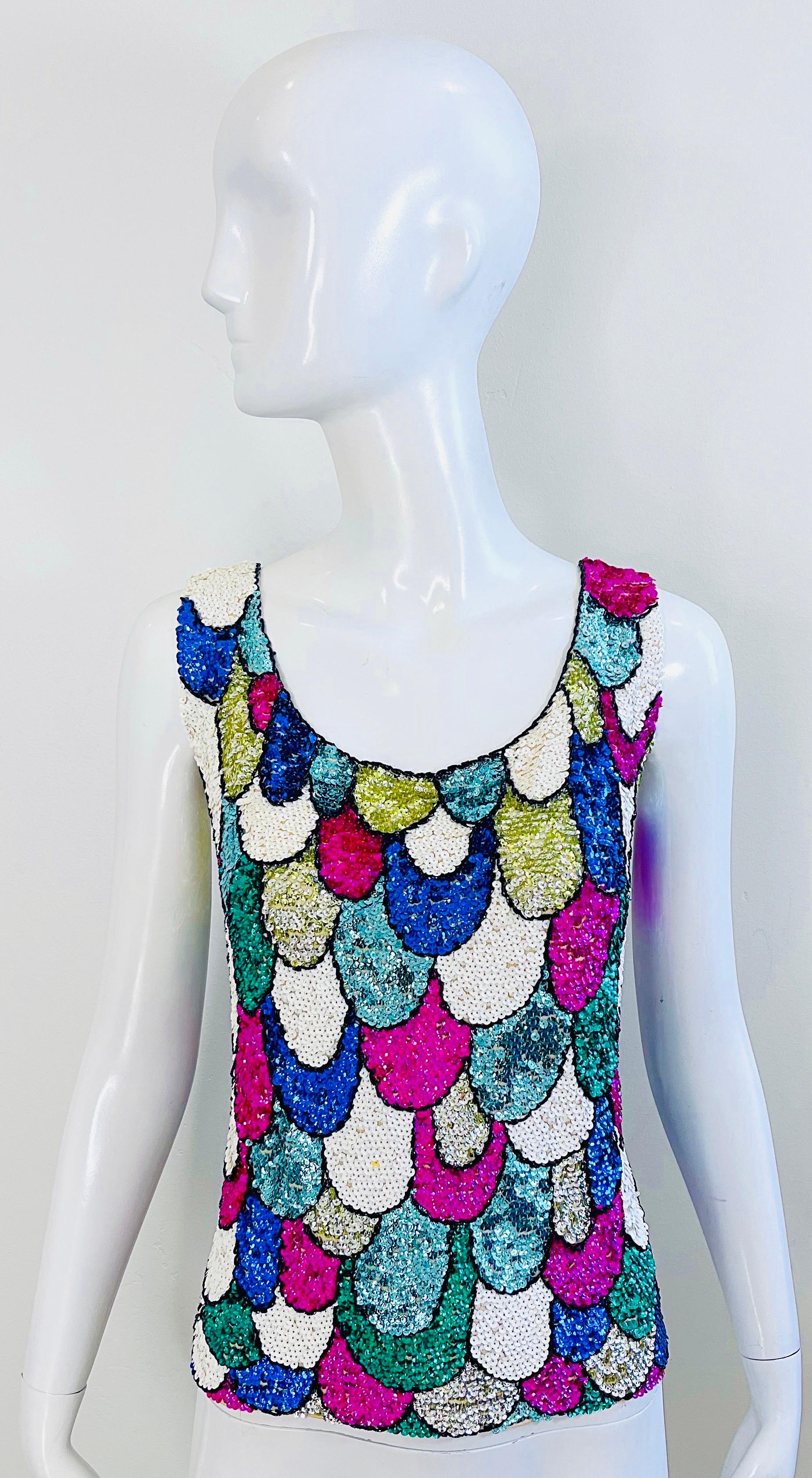 Chic British Hong Kong fully sequined colorful fish scale sleeveless sweater top ! Features vibrant colors of pink, turquoise, blue, chartreuse green, and white. Hidden. Metal zipper up the back with hook-and-eye closure. Super soft wool, and fully