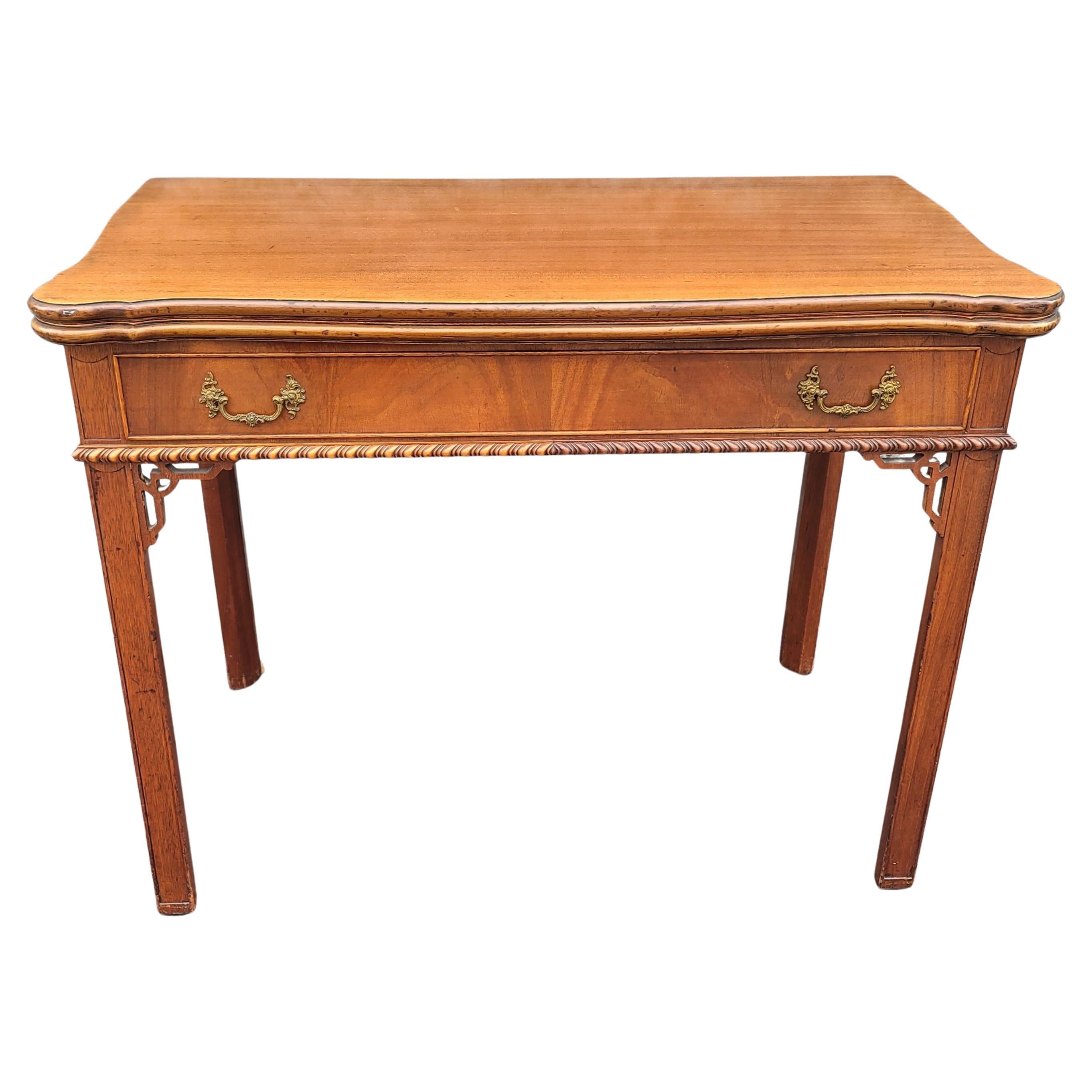 1960s George III style Mahogany extension console table or dining table with three leaves.
Measures 39