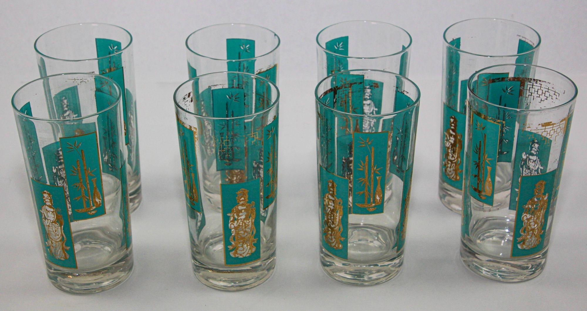 1960s Mid-Century 22-Karat gold and turquoise Shoji Asian Style Highball Glasses attributed to Georges Briard.
Mid-Century 22-Karat gold and blue Chinoiserie style highball tumbler glasses Set of 8.
This gorgeous in typical mid-century design