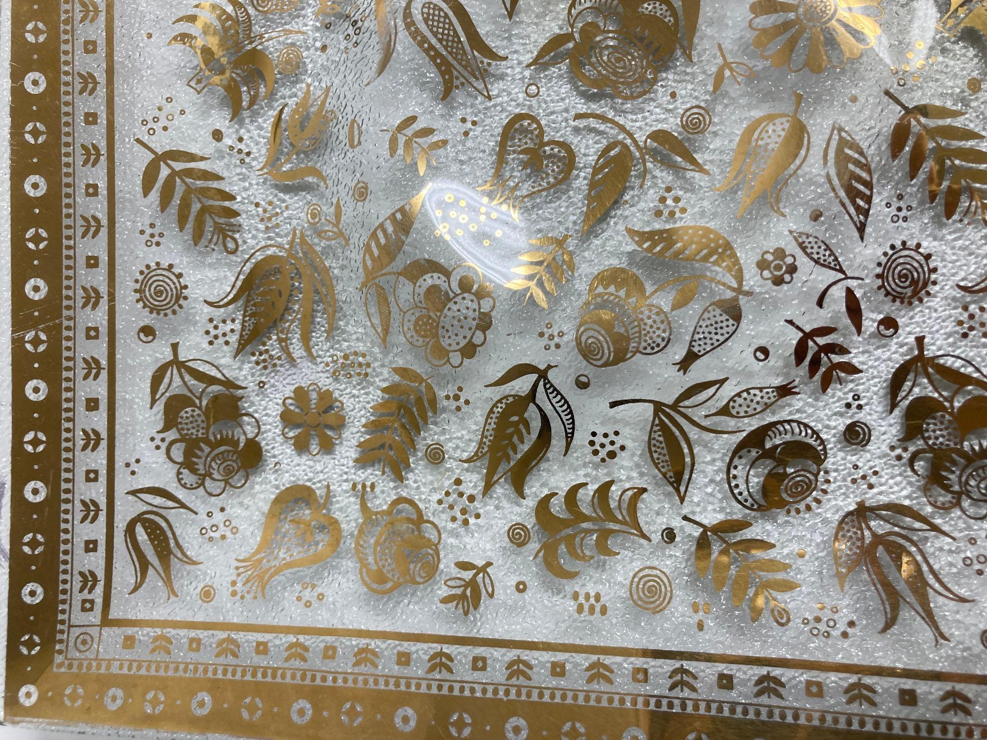 1960s Georges Briard Bent Glass Tray Persian Garden Pattern Dish.
Vintage gold and transparent floral serving dish by Georges Briard in the 22k gold 