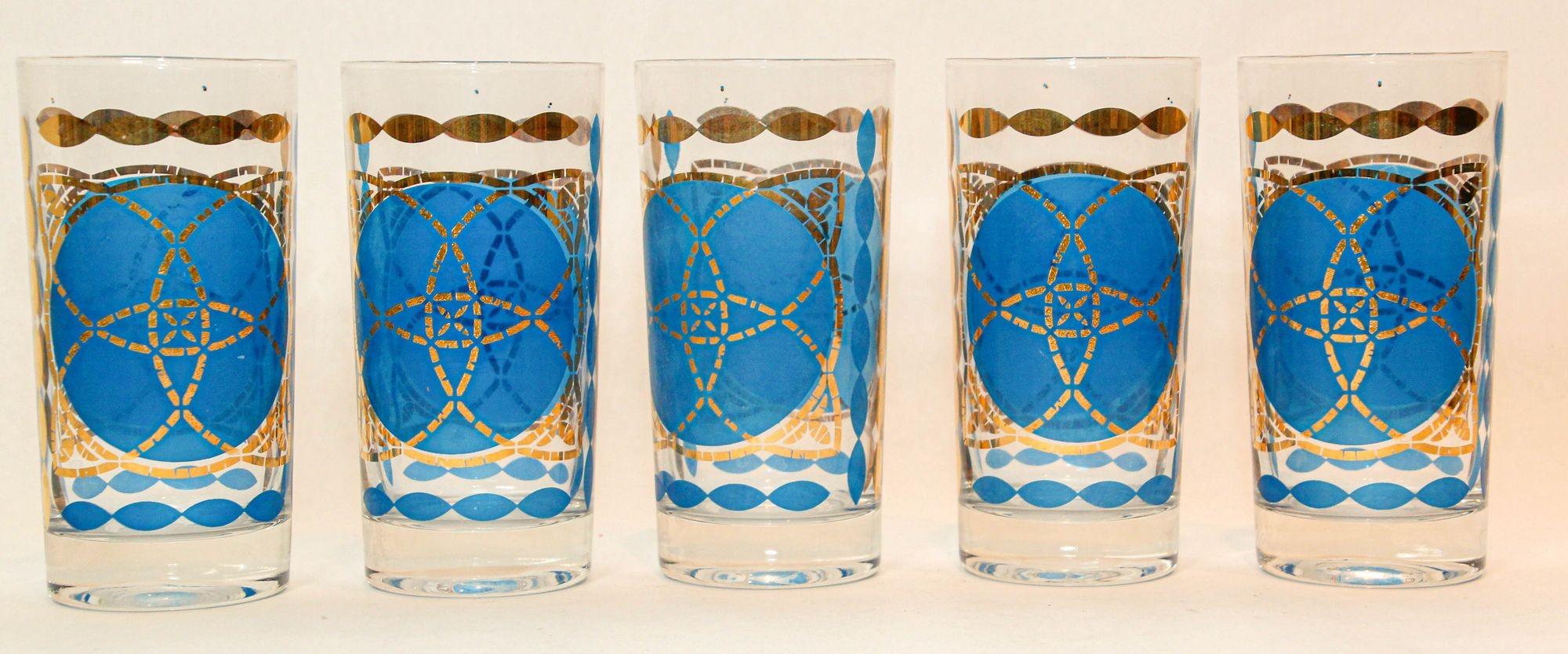 Fantastic mid century vintage cocktail glasses by Georges Briard set of 5.
Collectible 1960s Georges Briard Highball cocktail Glasses Blue and Gold Design Set of 5 Barware set.
Hollywood Regency vintage set of 5 highball tumbler drinking glasses