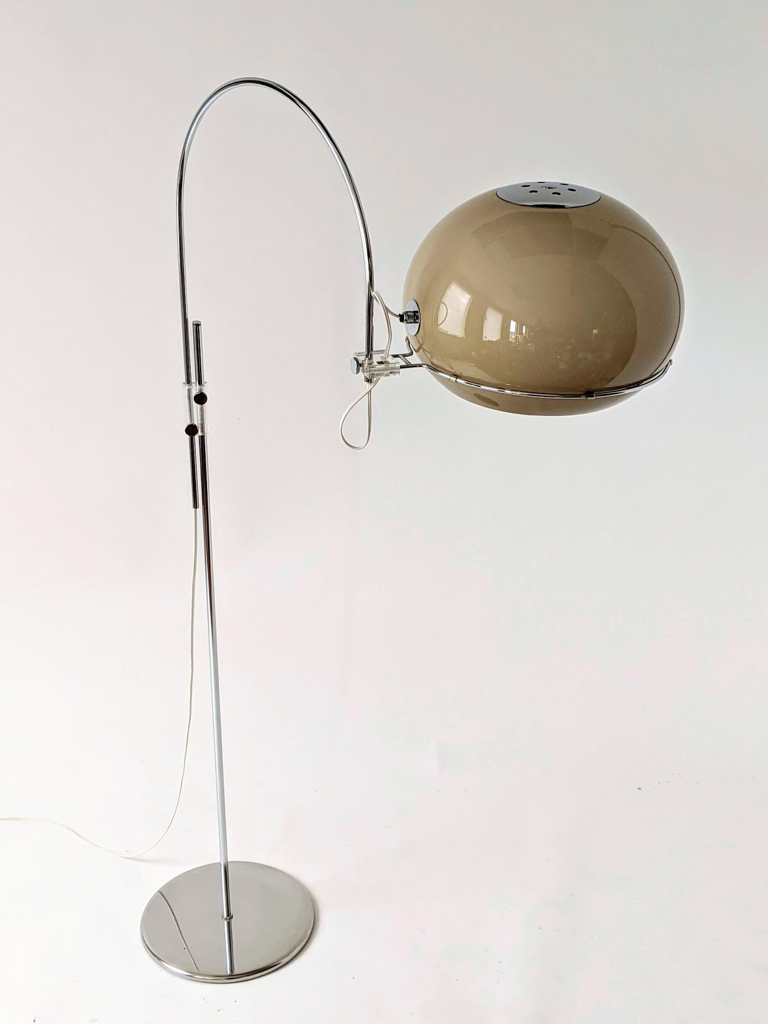 Elegant, versatile chrome floor lamp with a warm tone acrylic shade. 

Arch goes up and down, pivot 360 degree and lock anywhere on pole. 

Support shade holder on tip of arch pivot 360 degree. 

Vented shade move in a limited eyeball movement and