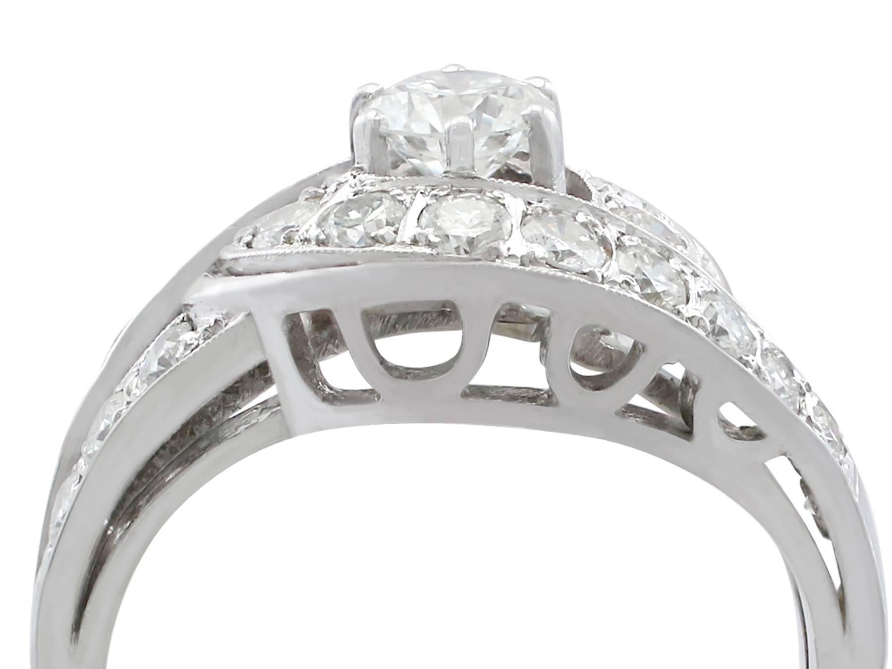 An impressive vintage German 1.88 Ct diamond and 18k white gold twist style cocktail ring; part of our diverse diamond jewelry and estate jewelry collections.

This fine and impressive vintage diamond cocktail ring has been crafted in 14 Ct white