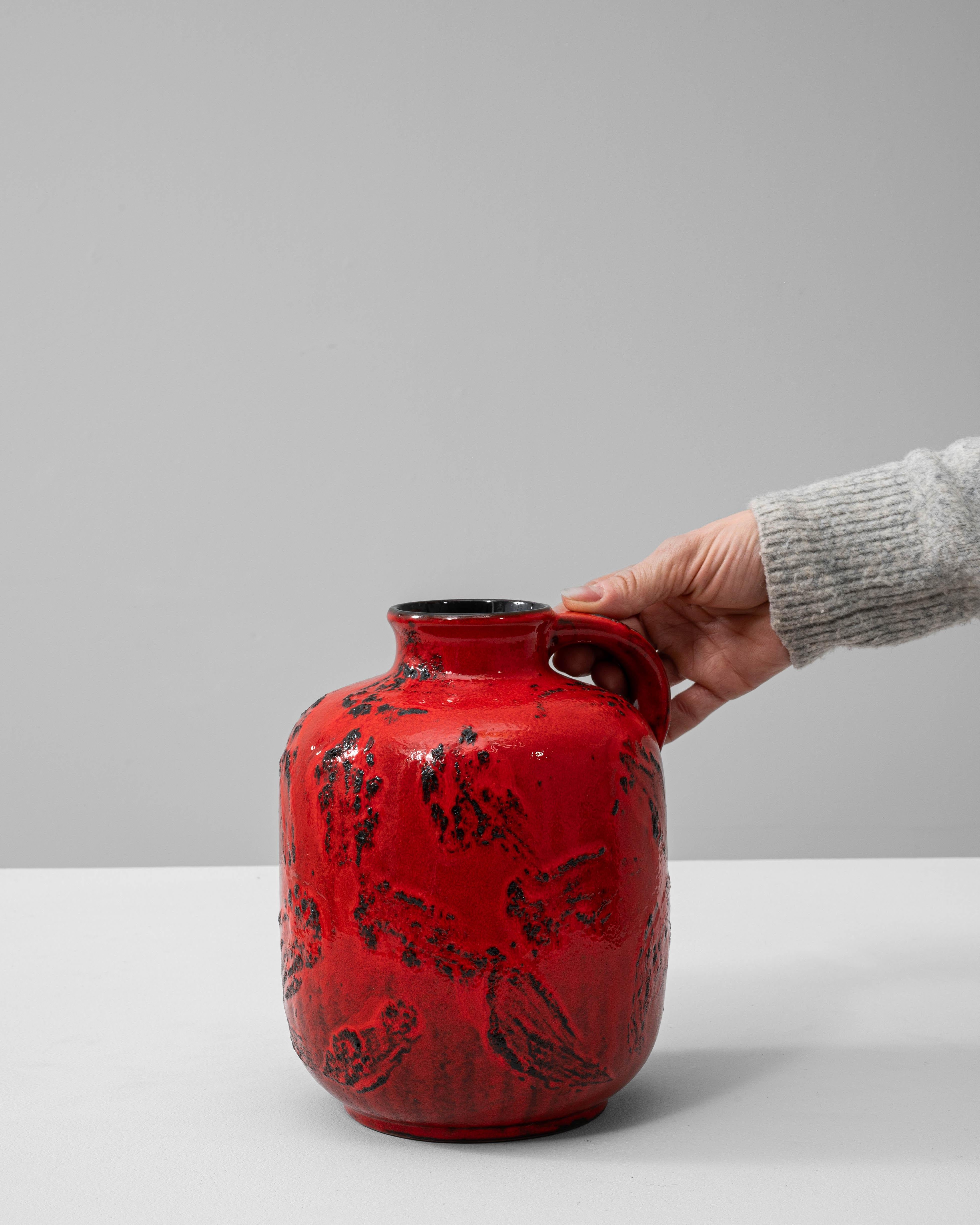 This 1960s German ceramic vase exemplifies the bold and expressive style associated with West German 