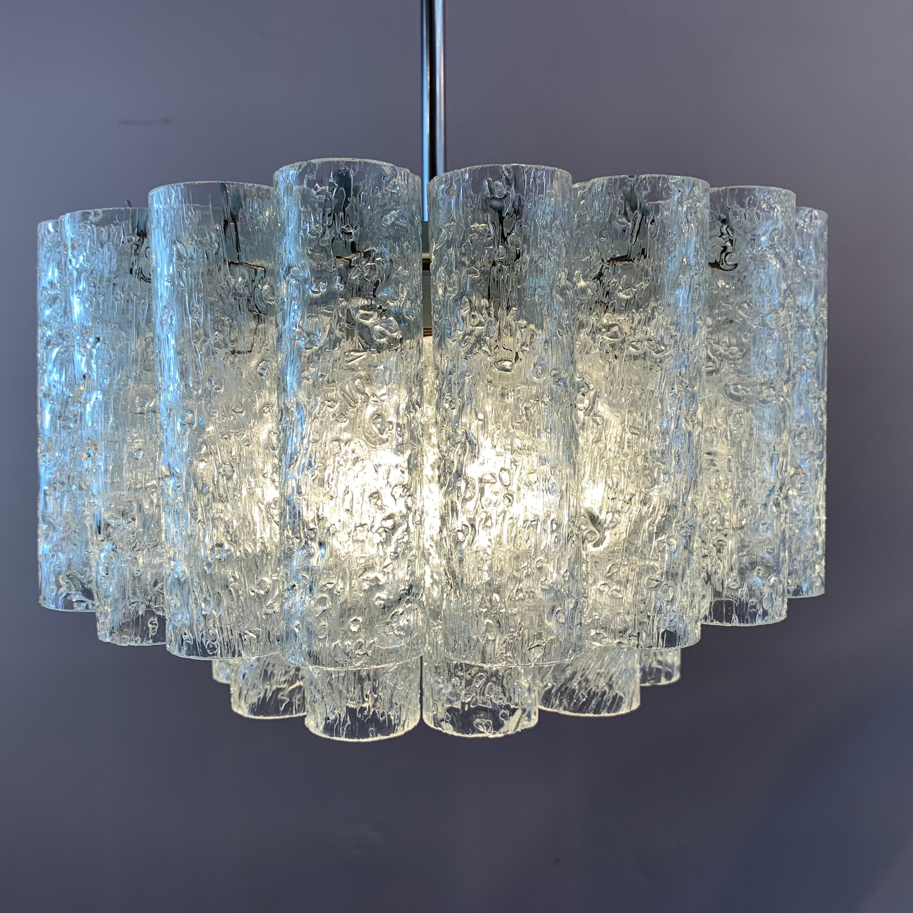 1960s German Doria Leuchten crystal glass two-tier tubular chandelier hanging light. Each crystal tube is suspended from a lacquered white frame with a feature chrome tube at the base of the wire flex with a matching ceiling cup. A single screw-in