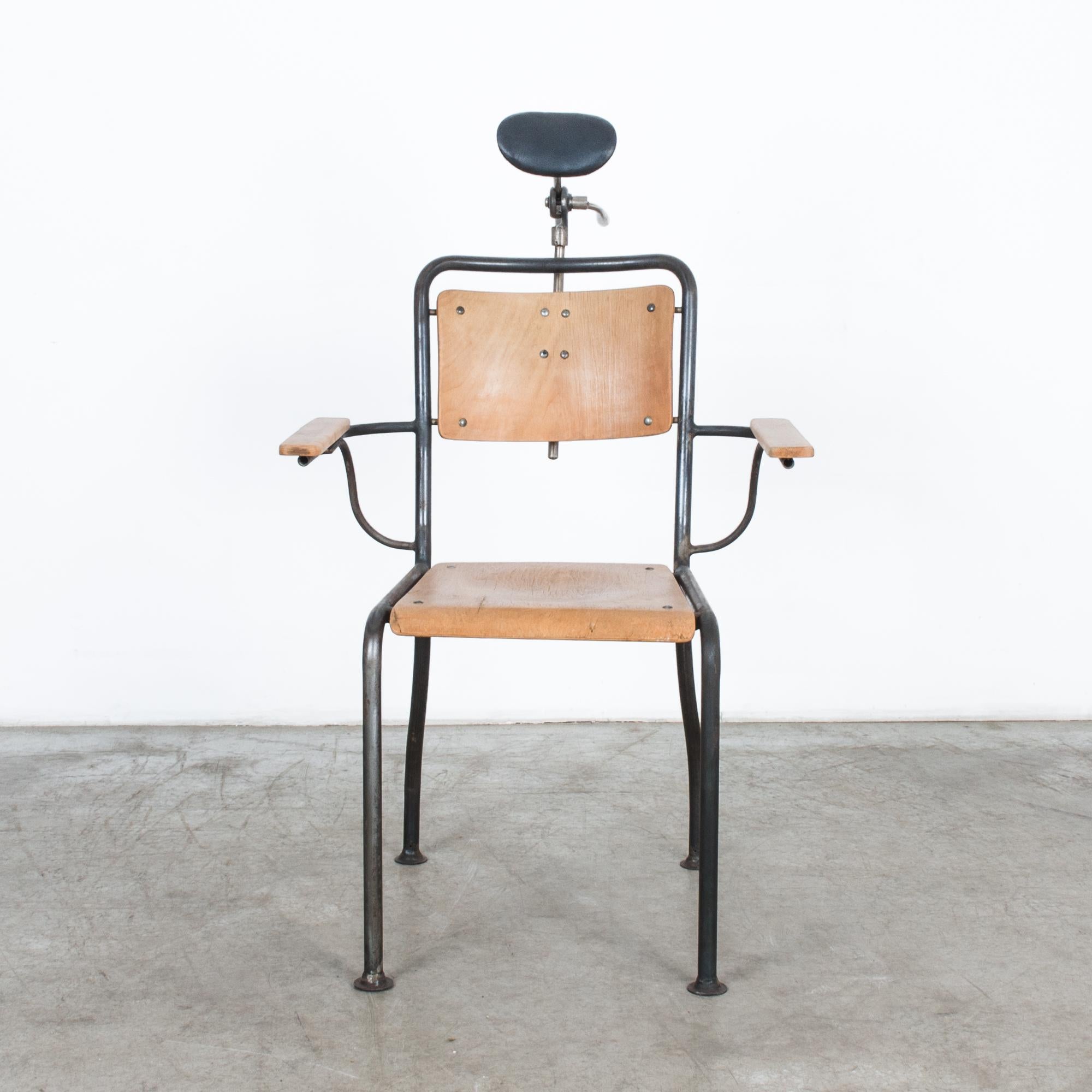 In the progressive era of 1960s Germany, this metal dentist armchair epitomizes the blend of functionality and modern design prevalent during the period. Crafted with precision engineering and attention to detail, this chair reflects the innovative
