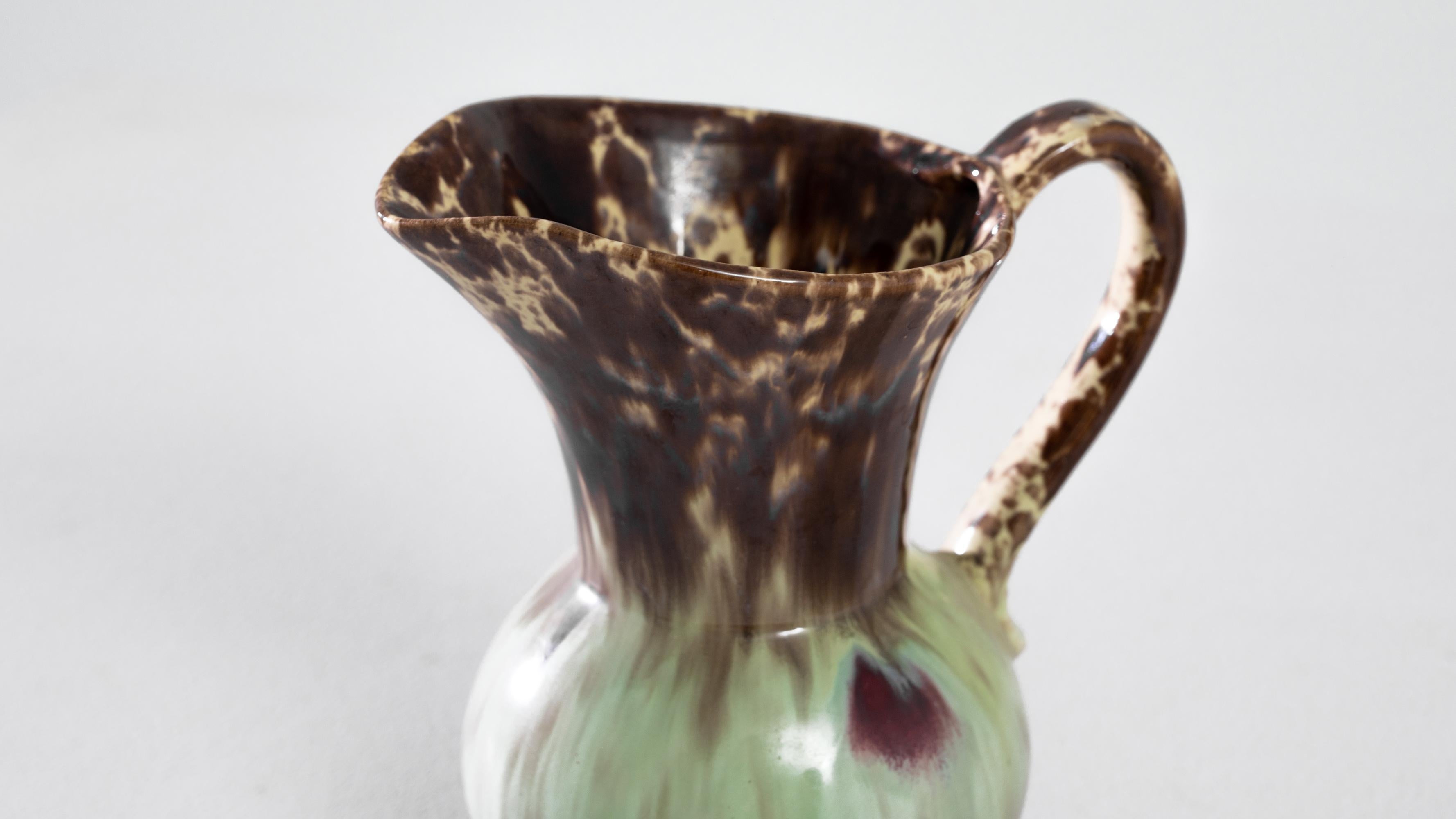 Discover a piece of 1960s German craftsmanship with this ceramic vase, distinguished by its 