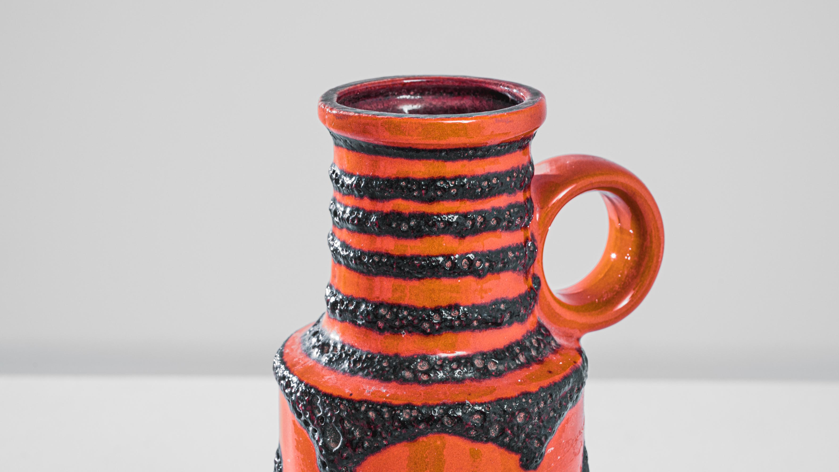 This striking 1960s German ceramic vase, stamped with 
