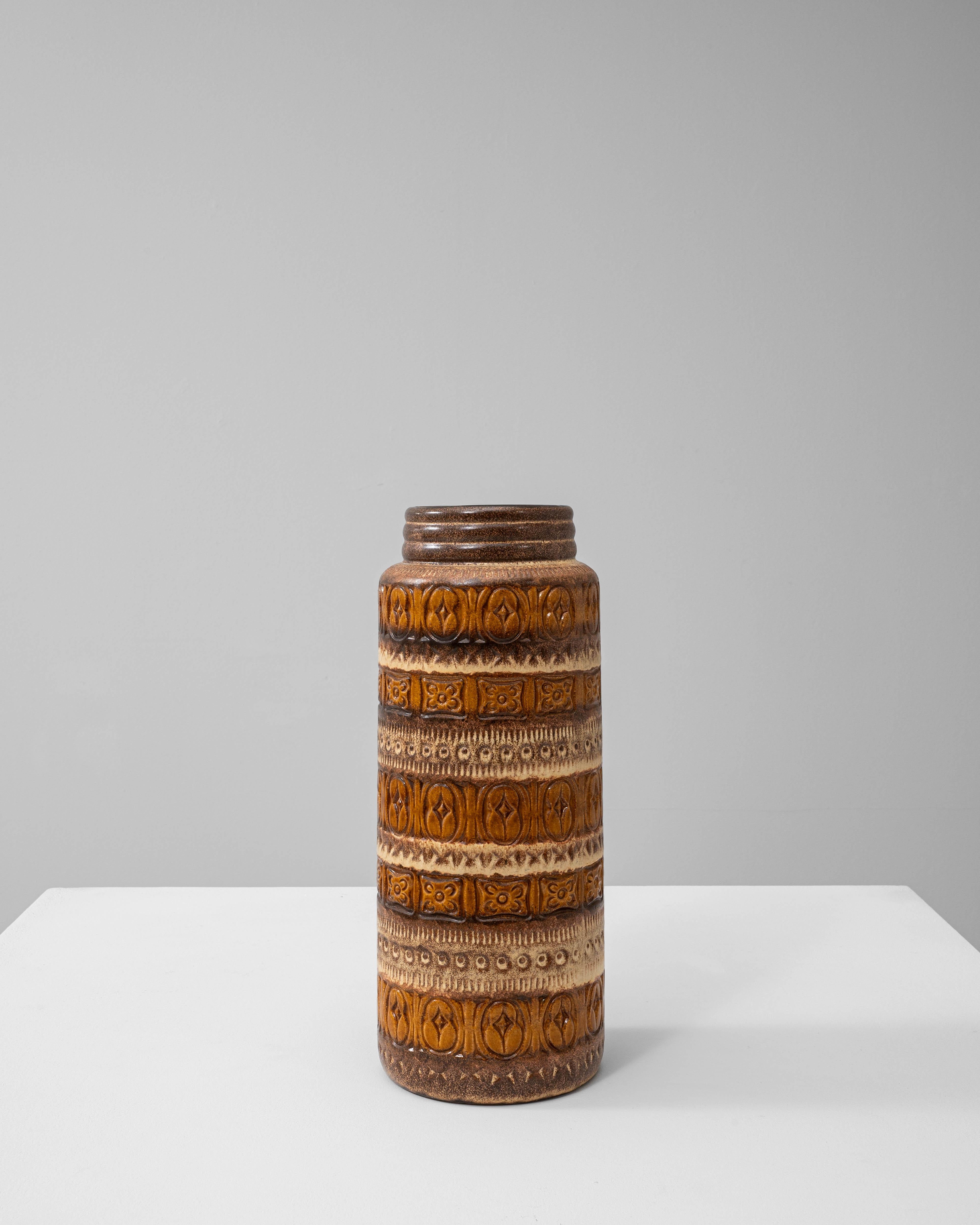 This 1960s German ceramic vase, marked “W. Germany,” is a striking example of mid-century West German pottery, often referred to as 