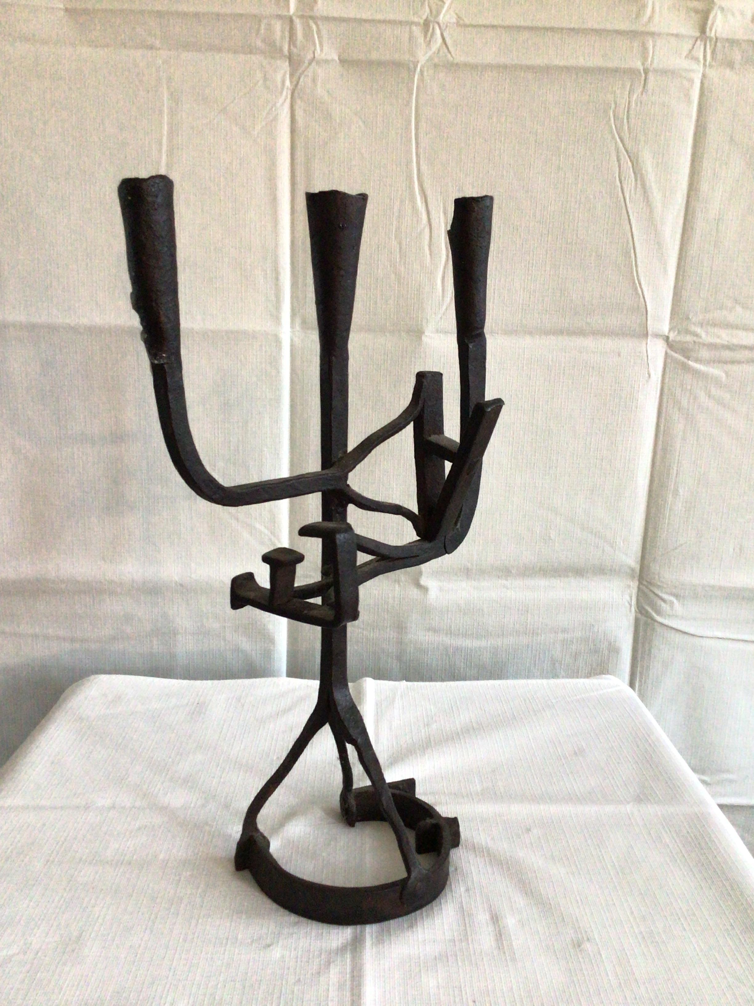 1960s Giacometti style handwrought iron candleholder.