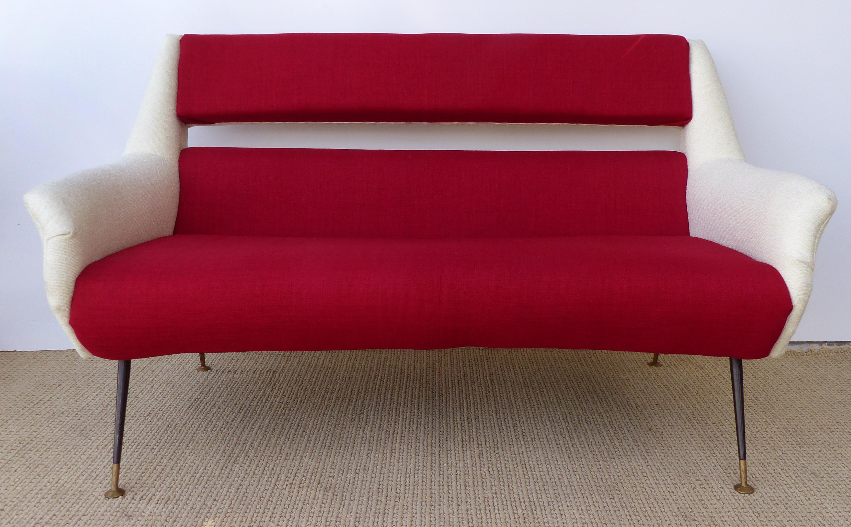1960s Gigi Radice Midcentury Italian Settee

This circa 1960 midcentury Italian settee by Gigi Radice newly upholstered with a two-tones of wool. The settee is supported by splayed enameled steel legs with brass capped feet. Arm, 20.5