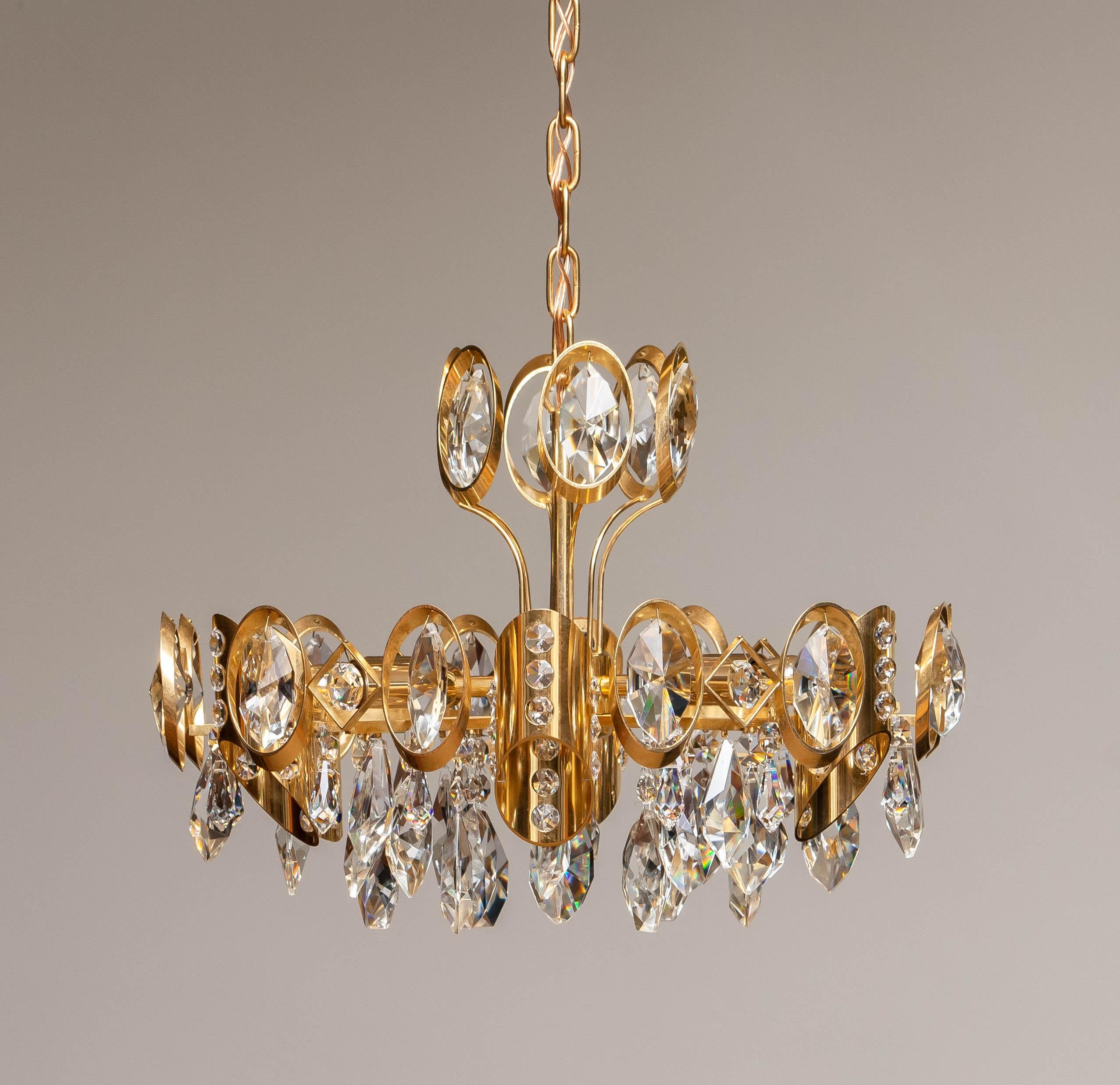 Mid-20th Century 1960's Gilt Brass Filled with Large Faceted Crystals Chandelier by Ernest Palme For Sale