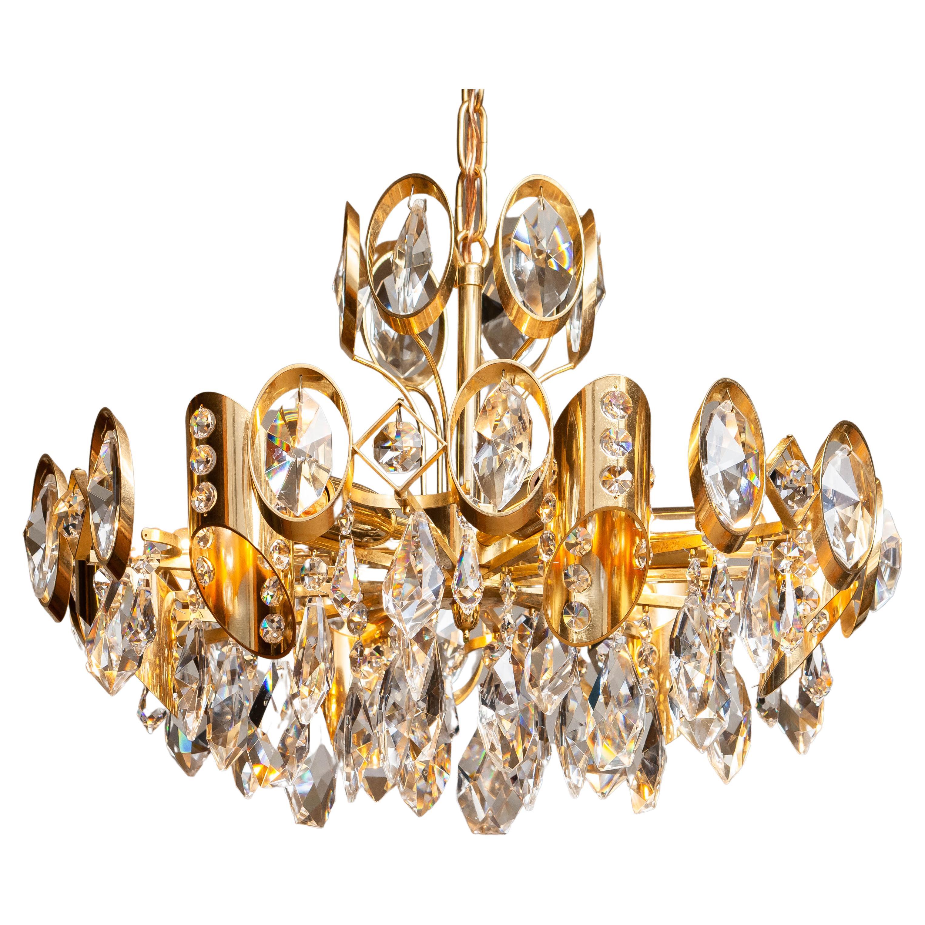 1960's Gilt Brass Filled with Large Faceted Crystals Chandelier by Ernest Palme