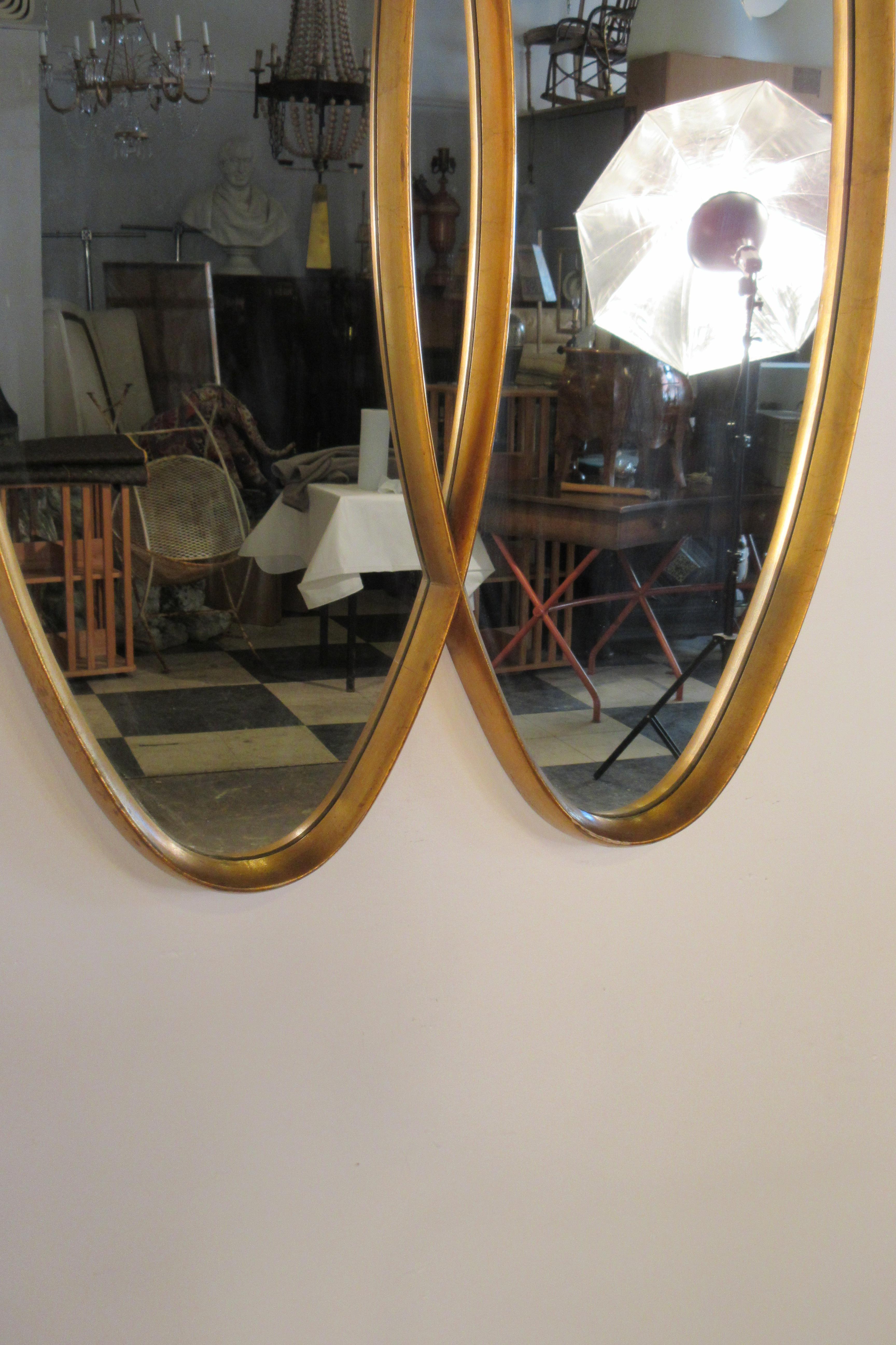 Mid-20th Century 1960s Gilt Oval Intersected Mirror