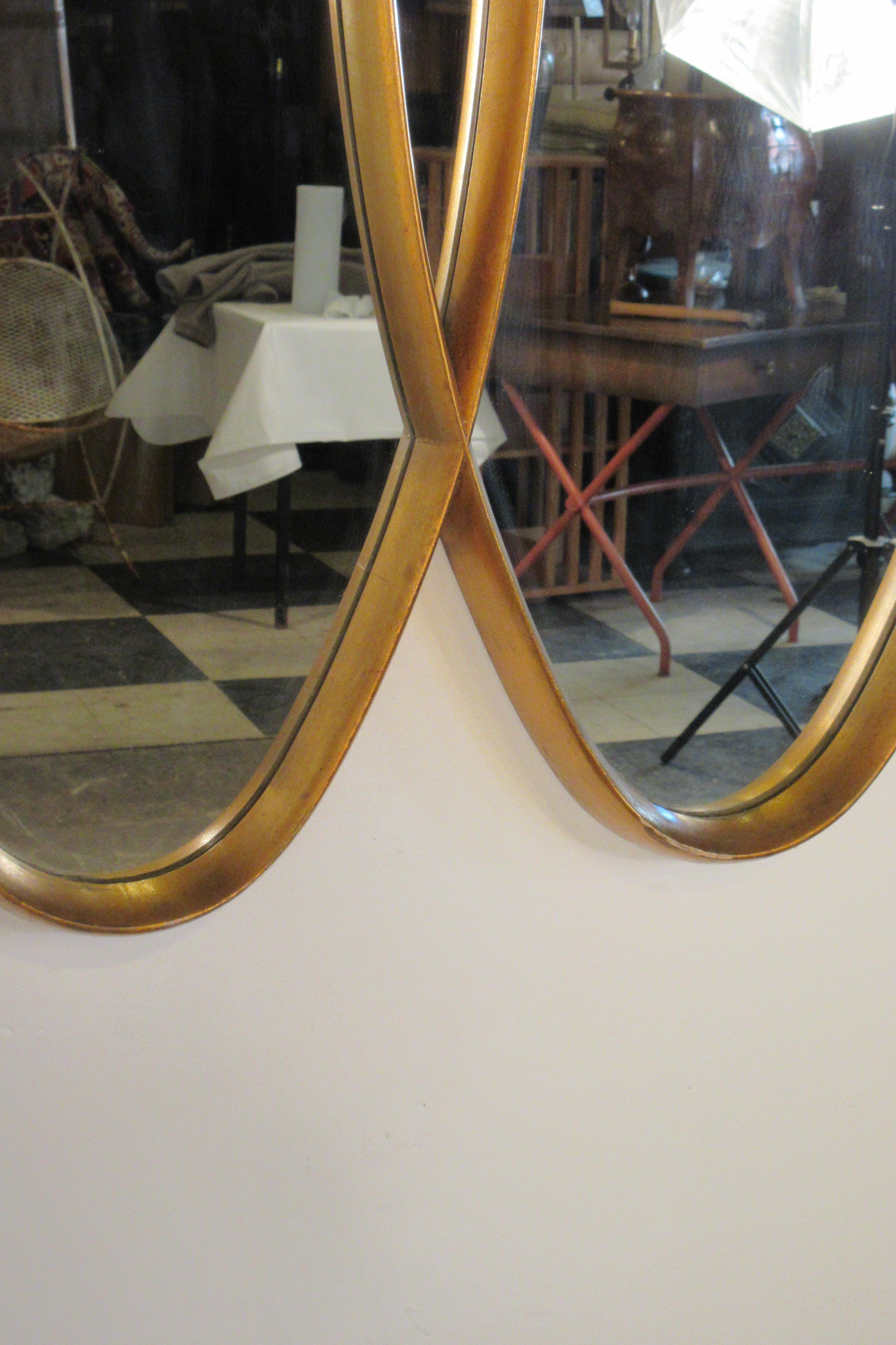 1960s Gilt Oval Intersected Mirror 1