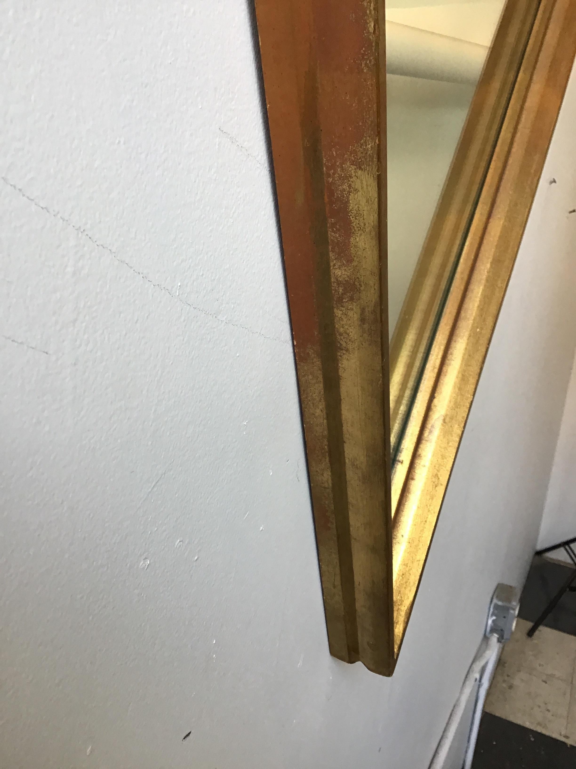 1960s giltwood diamond shaped mirror.
This item can be shipped UPS.