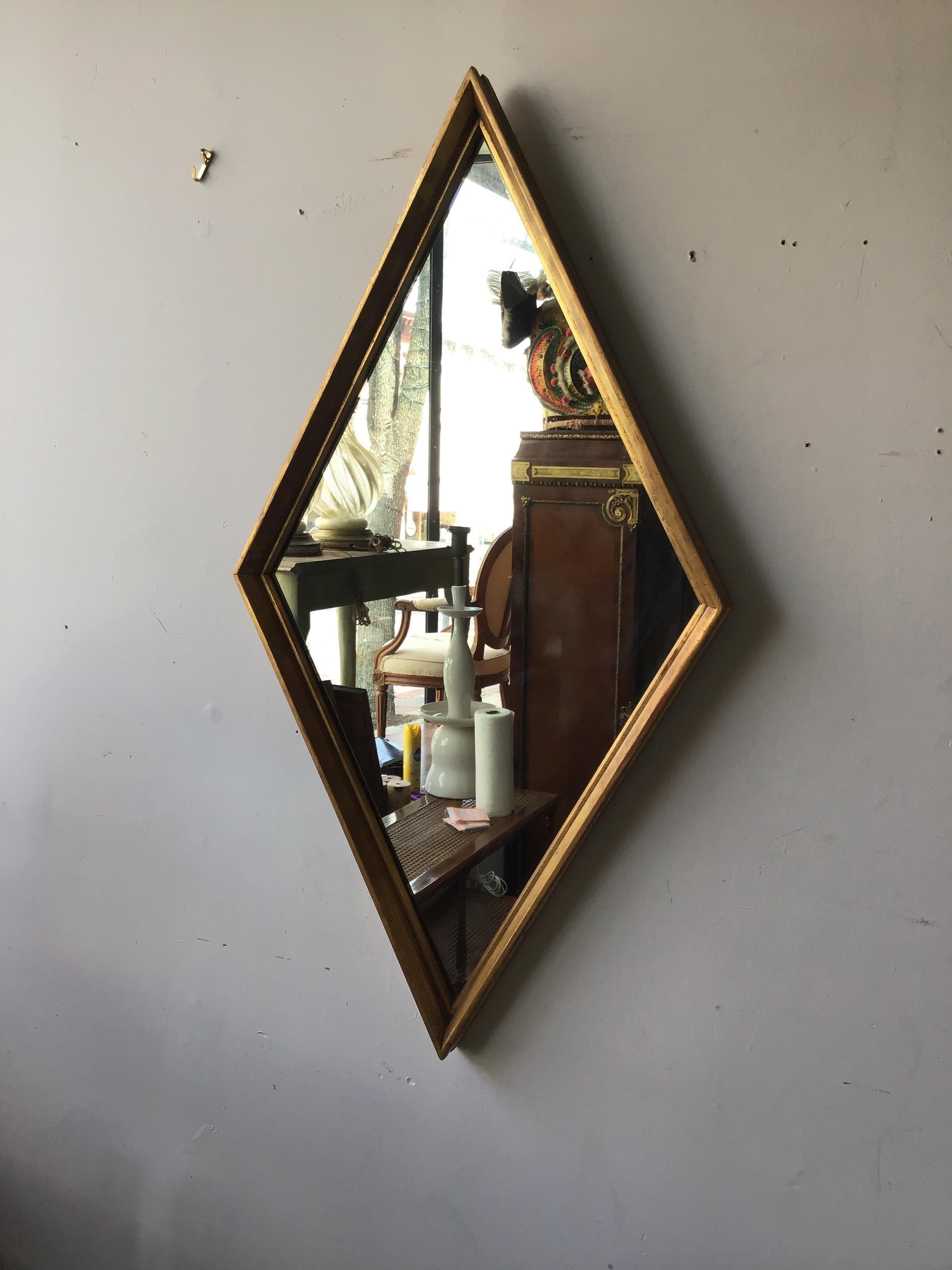 large diamond shaped mirror