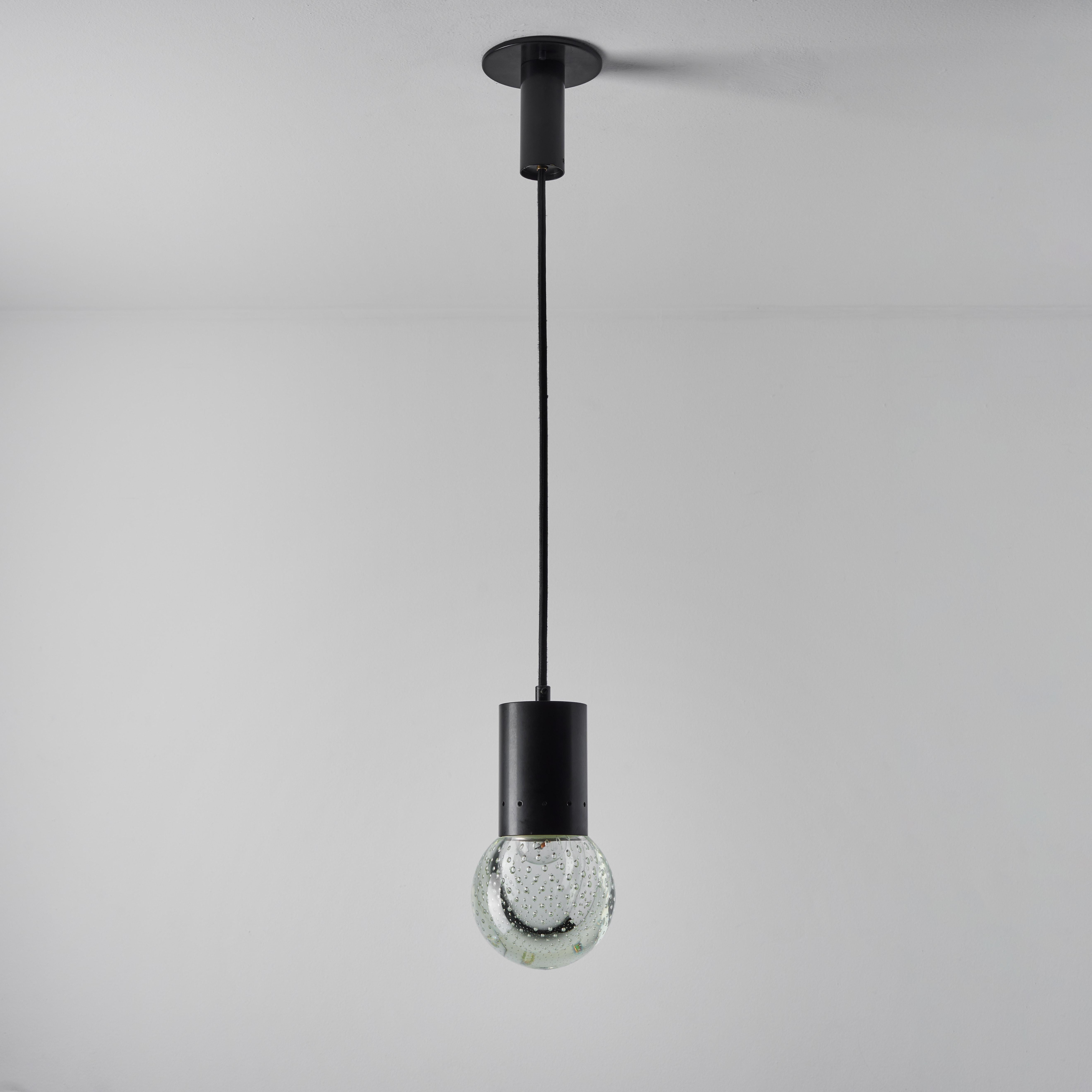 1960s Gino Sarfatti metal and Seguso glass pendant for Arteluce. Executed in hand blown bubbled Seguso glass and painted metal. The simplicity of Sarfatti's design and the sculptural shaping of the materials make for an incredibly refined example of