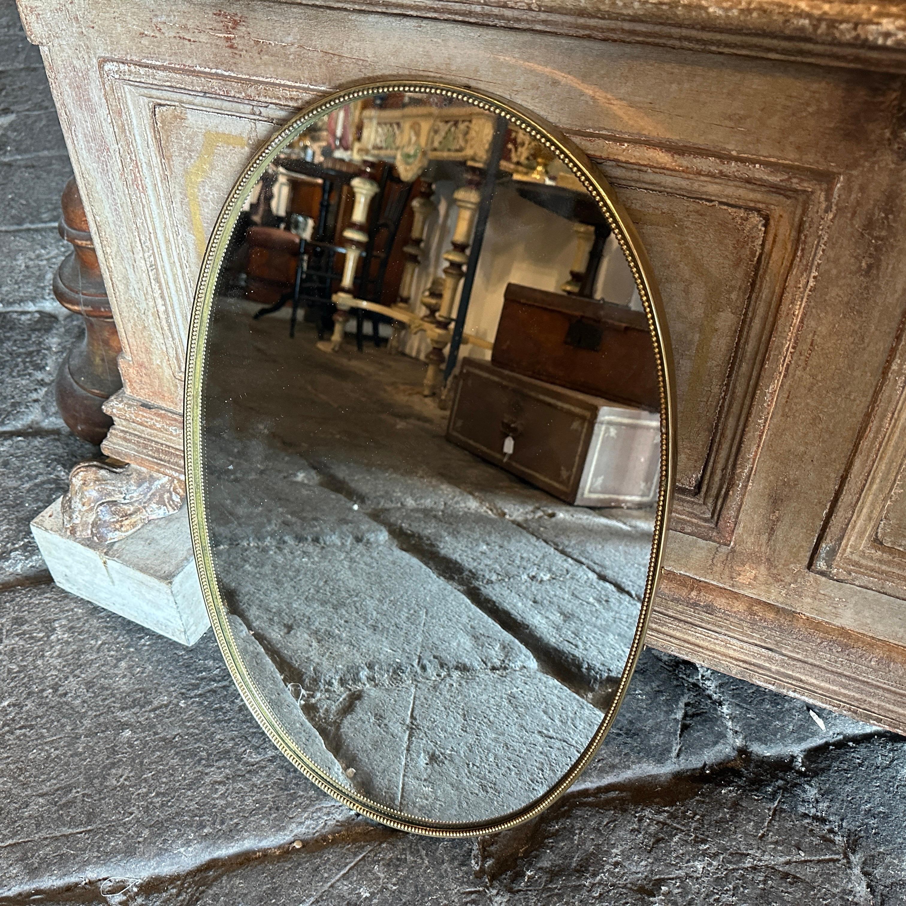 Hand-Crafted 1960s Giò Ponti Style Mid-Century Modern Brass Italian Oval Wall Mirror For Sale