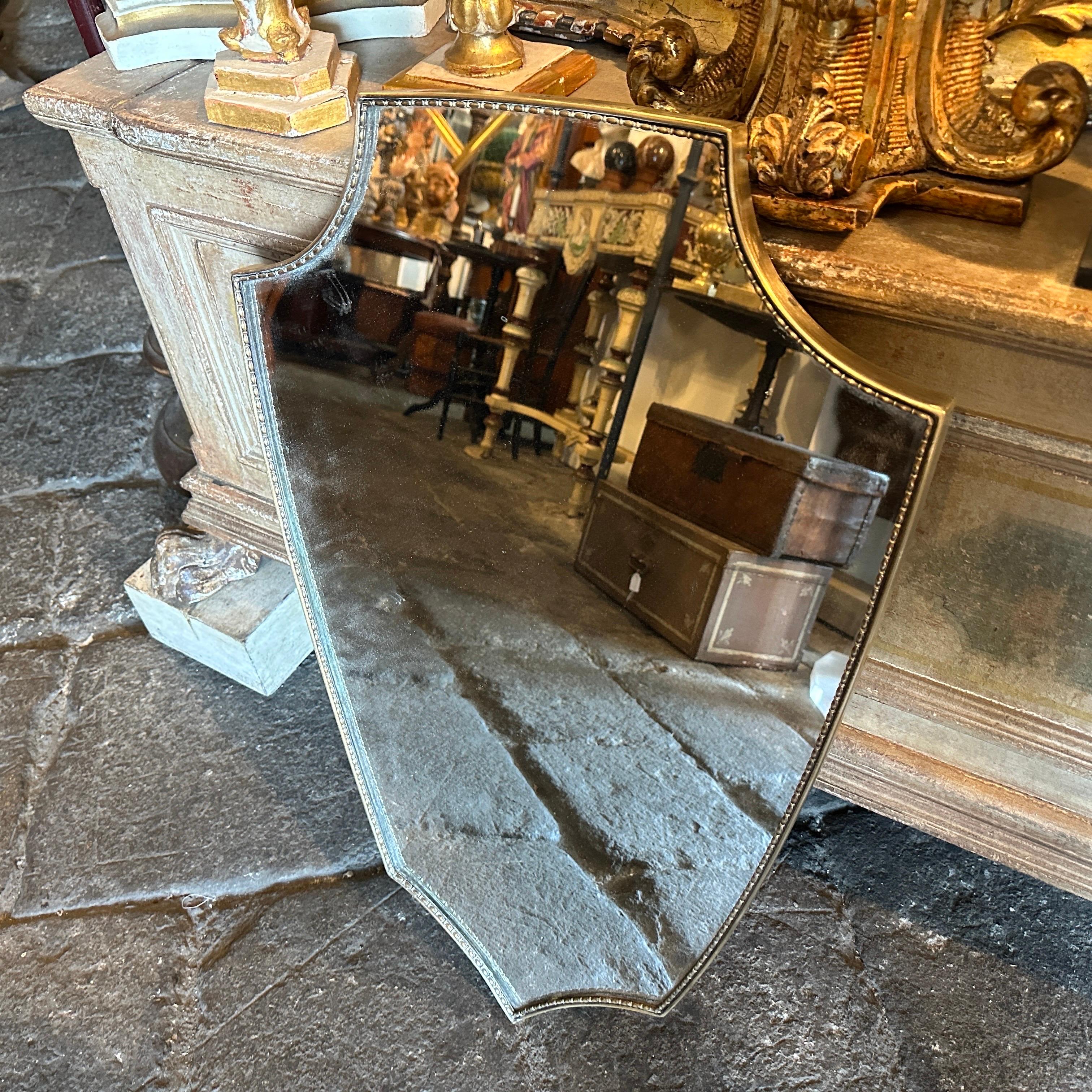 Hand-Crafted 1960s Gio Ponti Style Mid-Century Modern Brass Italian Shield Wall Mirror For Sale