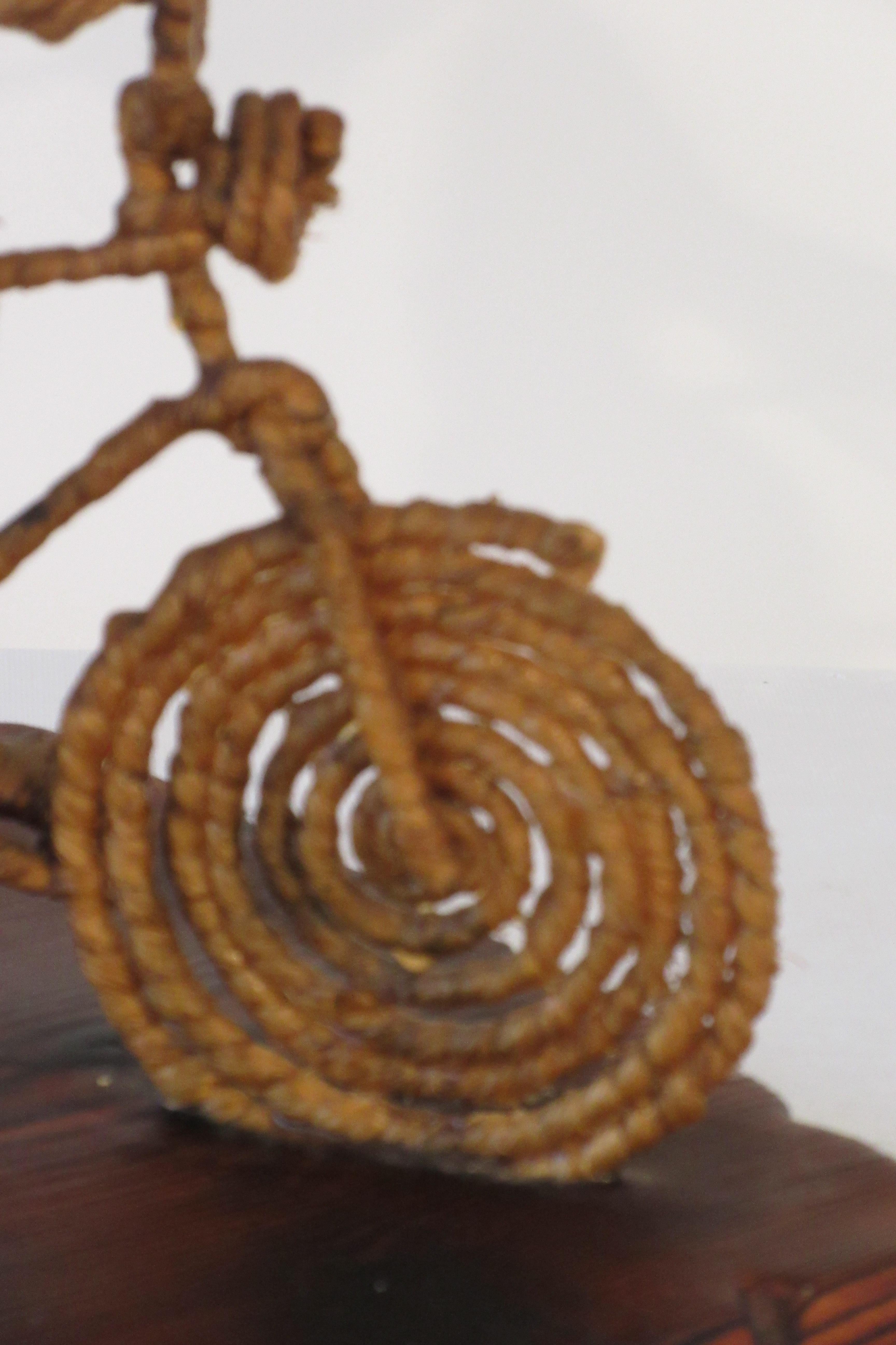 1960s Girl on Bike Rope Sculpture 7