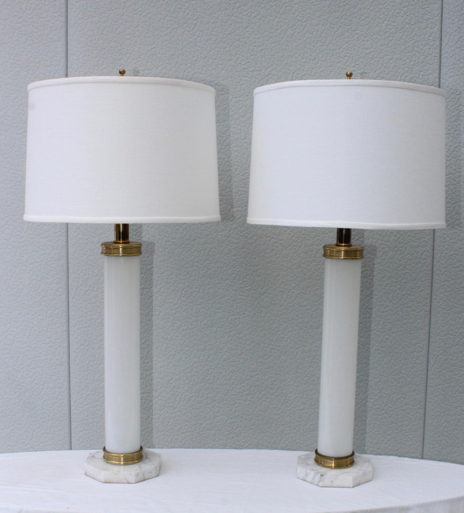 1960's Mid-Century Modern Italian table lamps with Carrara marble base glass and brass, in vintage original condition with some wear and patina due to age and use.

Height to light socket 28.5''

Shades for photography only.