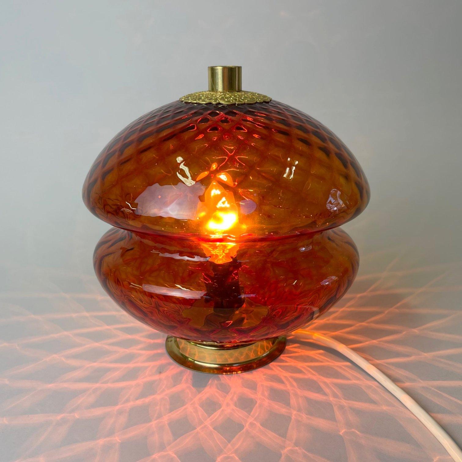 Beautiful glass table lamp or night lamp type T310 / 01 produced by the Czech glass factory Jablonecké Sklárny Desná in the 1960's. The lamp consists of a wonderful, hand-made glass shade in red with an interesting shape and structure in a diamond