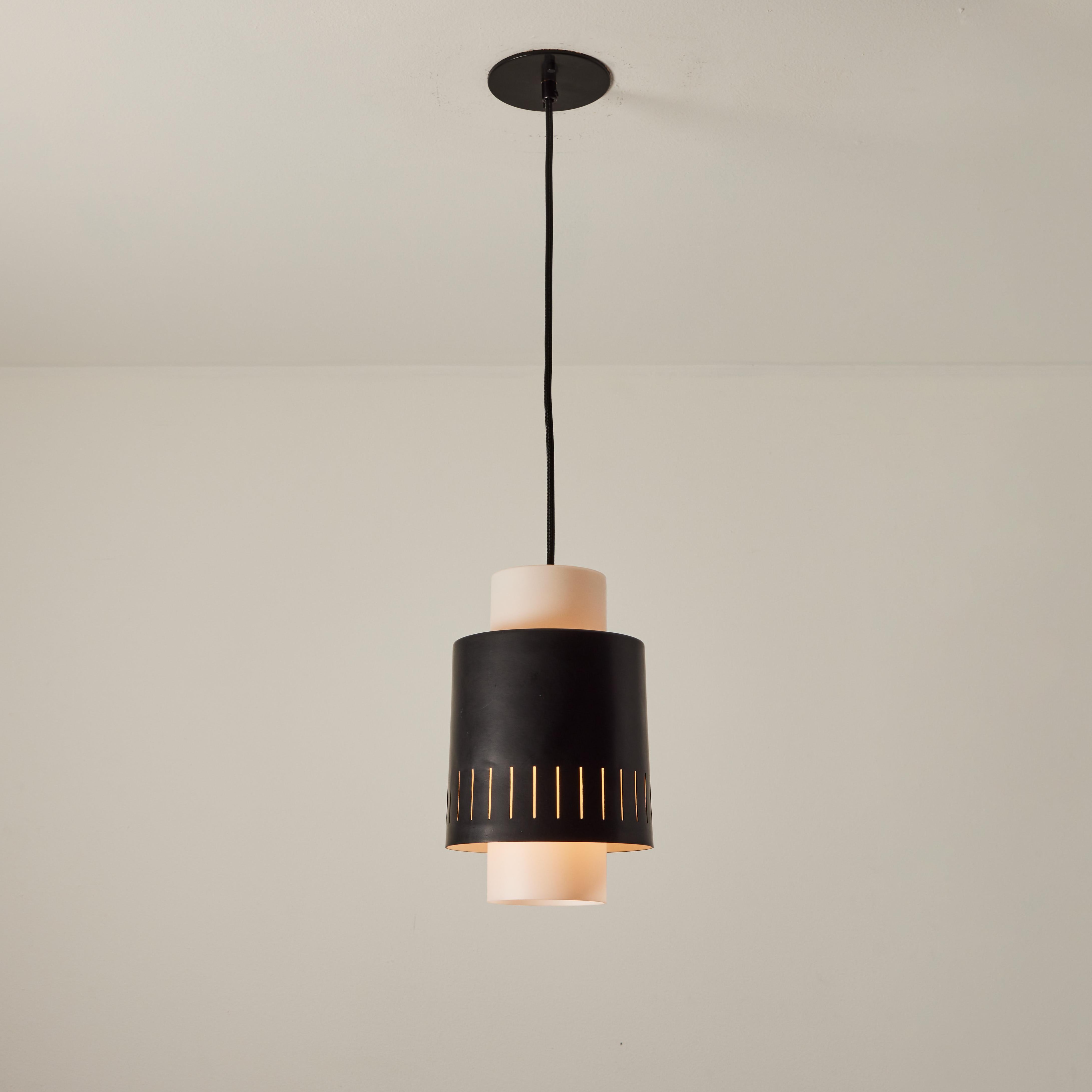 1950s Glass & perforated metal pendant attributed to Bruno Gatta for Stilnovo. A quintessentially 1950s Italian design executed in opaline glass and black painted metal. A highly functional and sculptural suspension light of attractive scale and