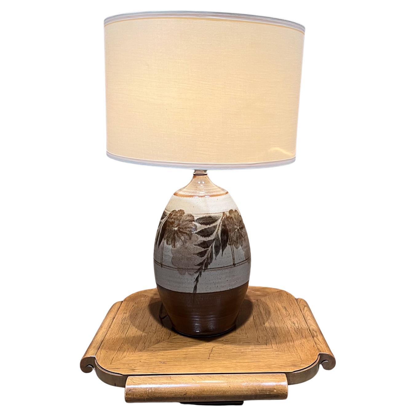 1960s Studio Art Pottery Tall Table Lamp Glazed Stoneware Floral design
in the Style of Gordon Martz, Wishon-Harrell
Unmarked
19.5 h x 9.5 diameter
Preowned unrestored original vintage.
No shade or bulb included
Tested and working.
Please refer to