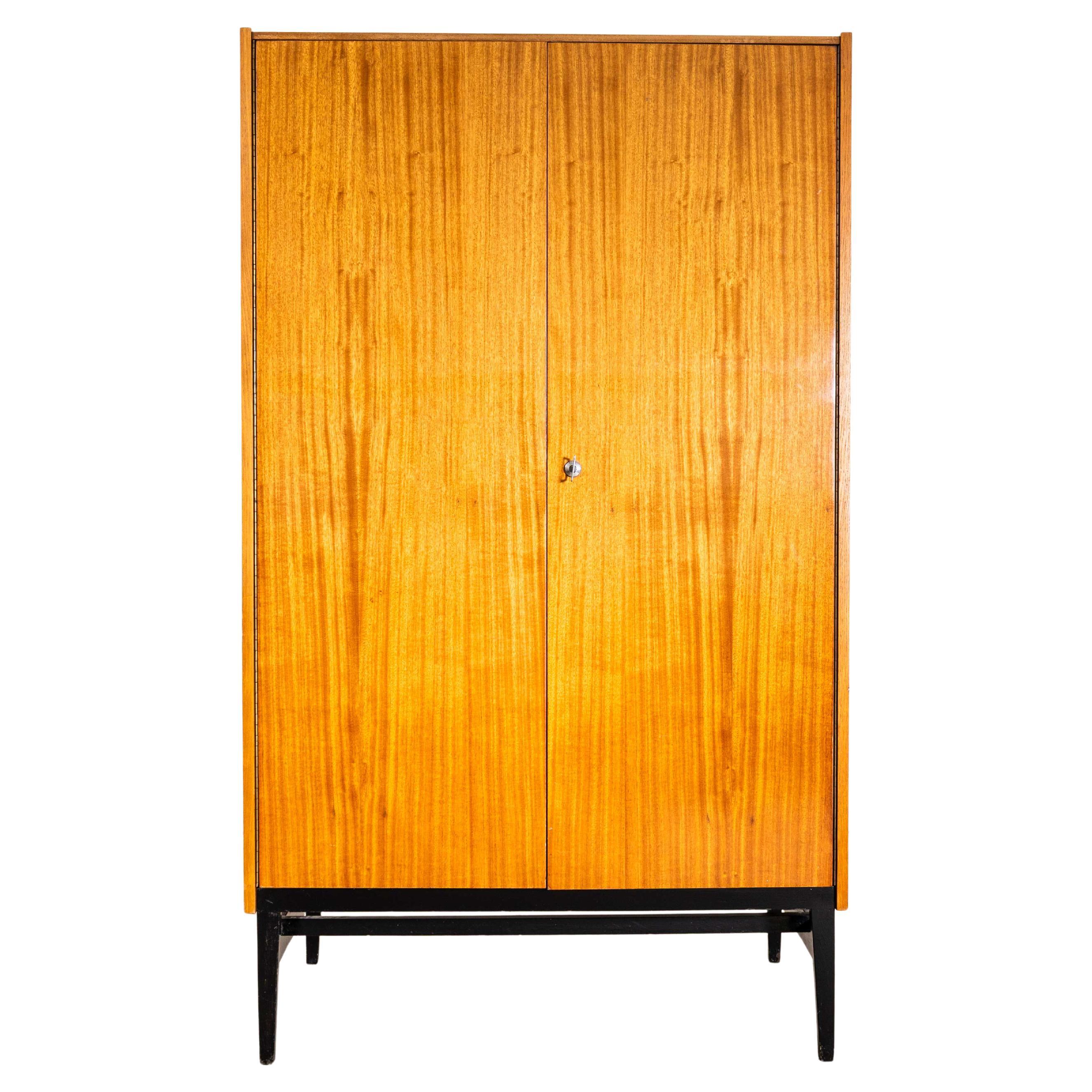 1960
s Glossy Mid-Century Cupboard With Ebonised Legs For Sale