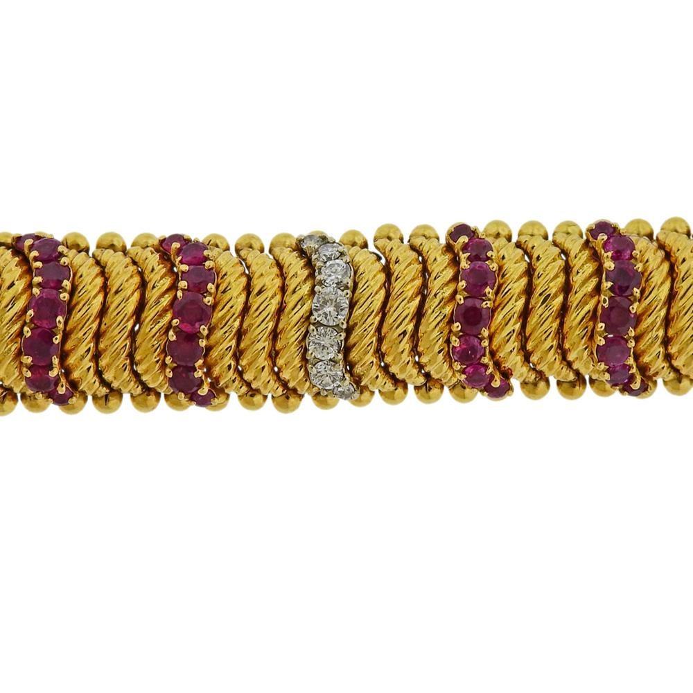 18k gold vintage 1960s bracelet, set with rubies and approx. 0.96ctw in diamonds. Bracelet is 7.5