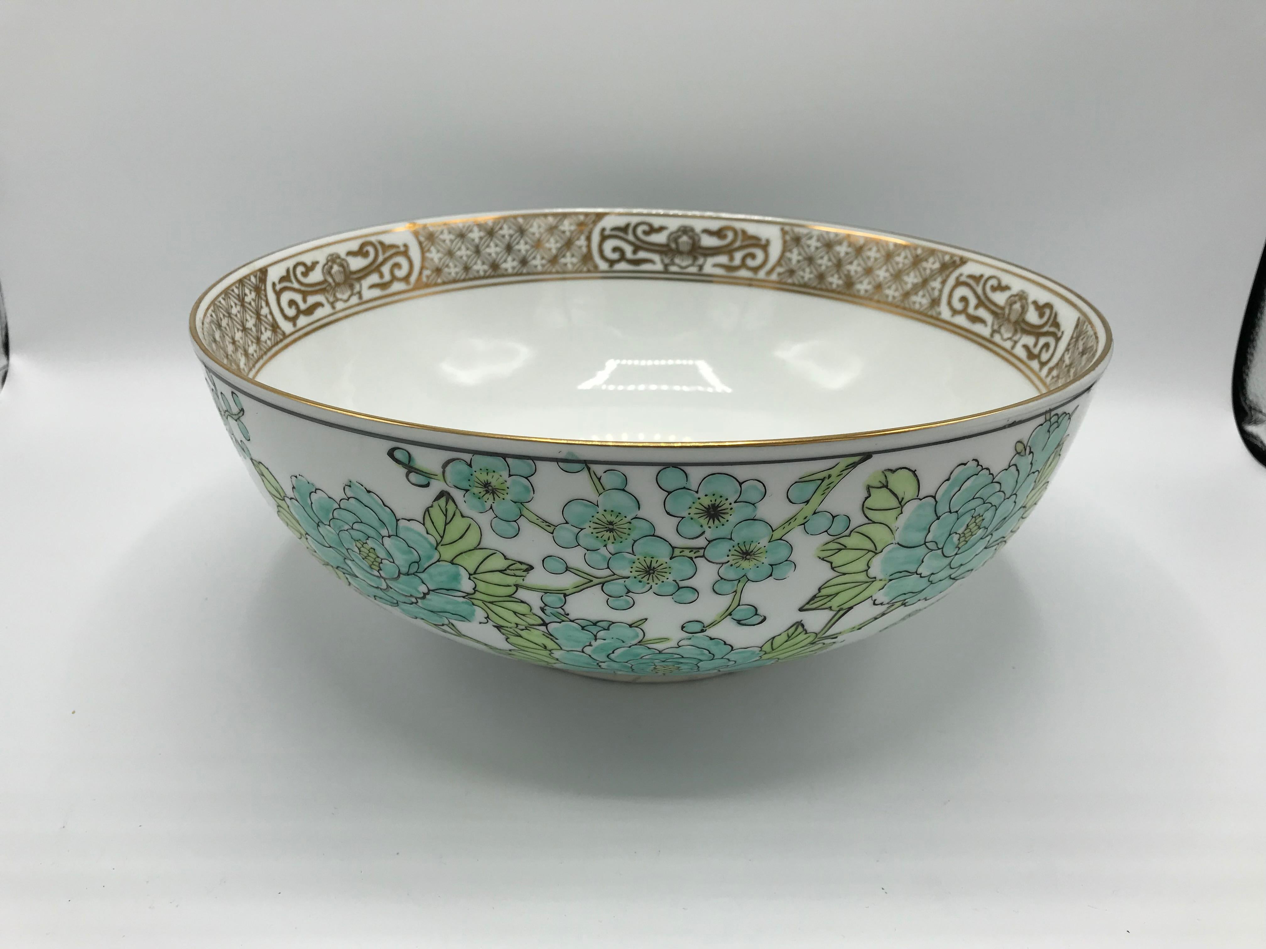 Offered is a fabulous, 1960s Gold-Imari porcelain peacock motif punch bowl. This large centerpiece bowl, has a gorgeous hand-painted green and gold peacock and floral motif all-over. Marked 'Gold Imari' on underside. Heavy, nearly 6lbs.