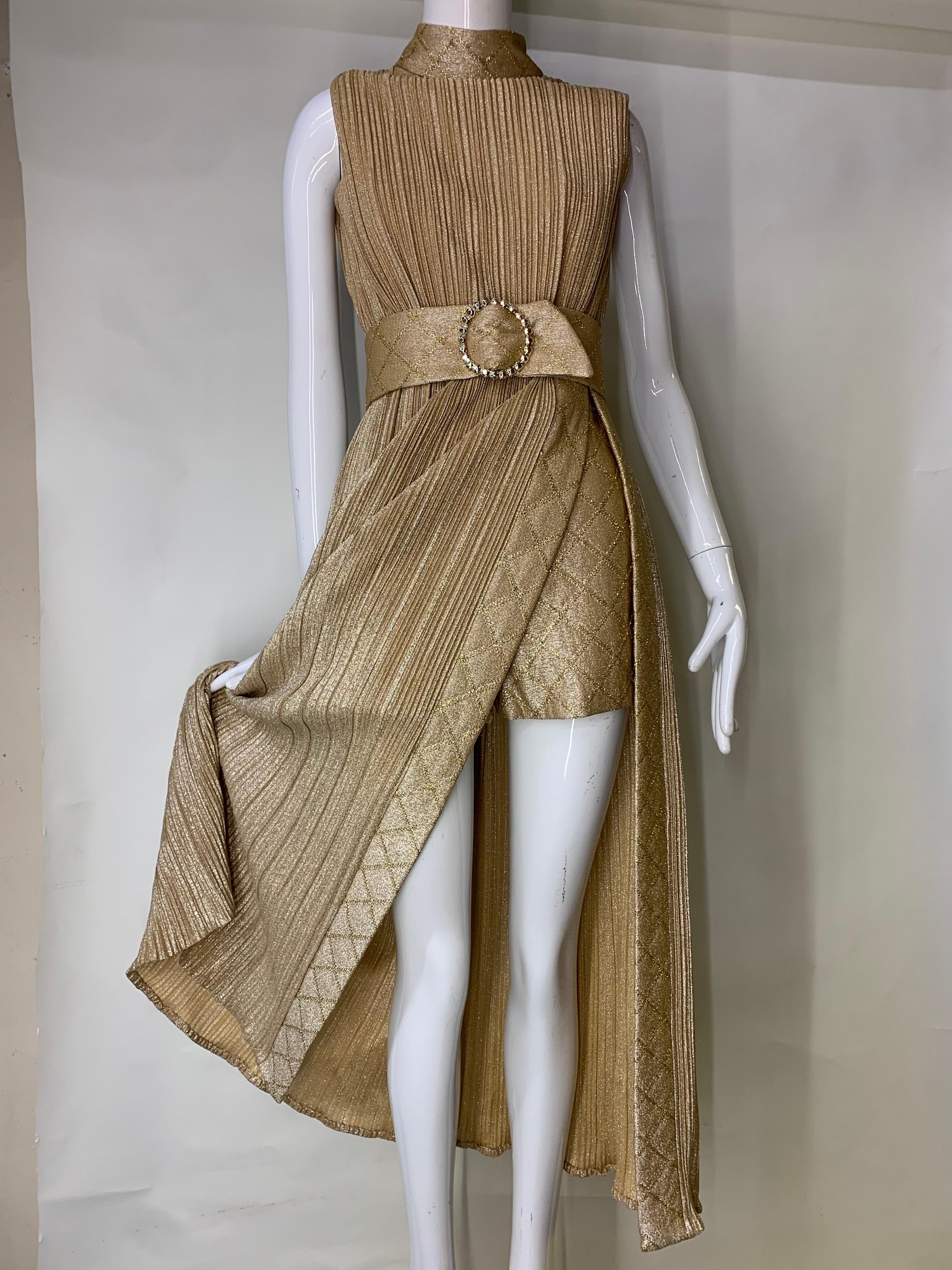 1960s Gold Lame Knit Tunic and Matching Quilted Lame Hot Pants Ensemble:  Micro-pleated gold lurex tunic in a Mod/Grecian style with high side opening revealing coordinating gold quilted hot pants with rhinestone buckle belt. Back zipper. US size 4. 