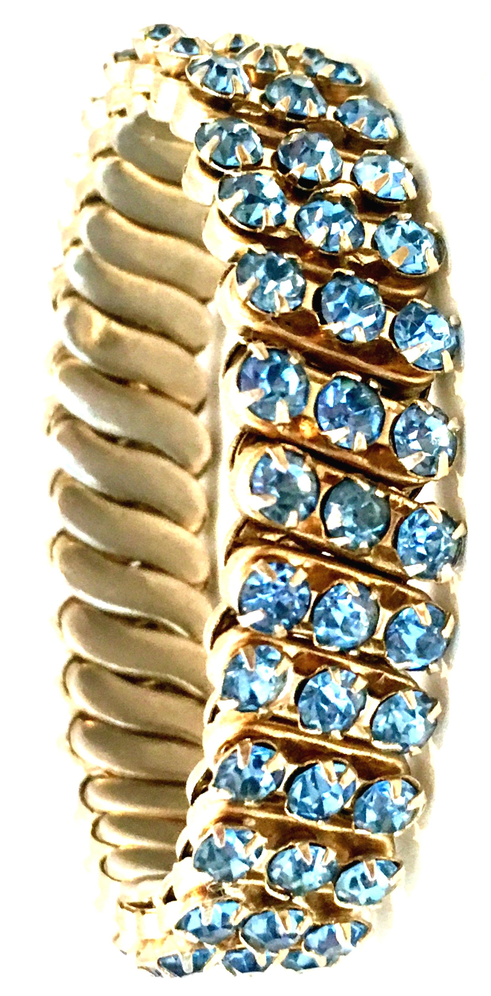 1960'S Gold Plate & Sapphire Blue Austrian Crystal Rhinestone Expansion Stretch Link Bracelet-Hong Kong. This unique gold gilt metal with fancy prong set sapphire blue Austrian crystal rhinestones, fits most wrists. Expands to approximately 4