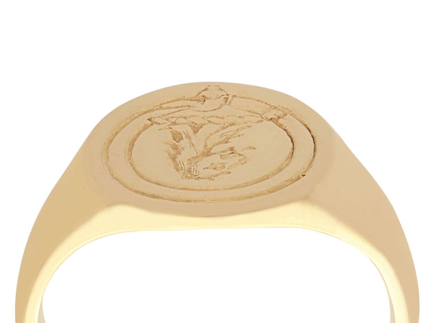 A fine and impressive intaglio signet ring in 18 karat yellow gold; part of our gent's jewelry and estate jewelry collections

This fine and impressive lion signet ring has been crafted in 18k yellow gold.

The circular anterior face of this