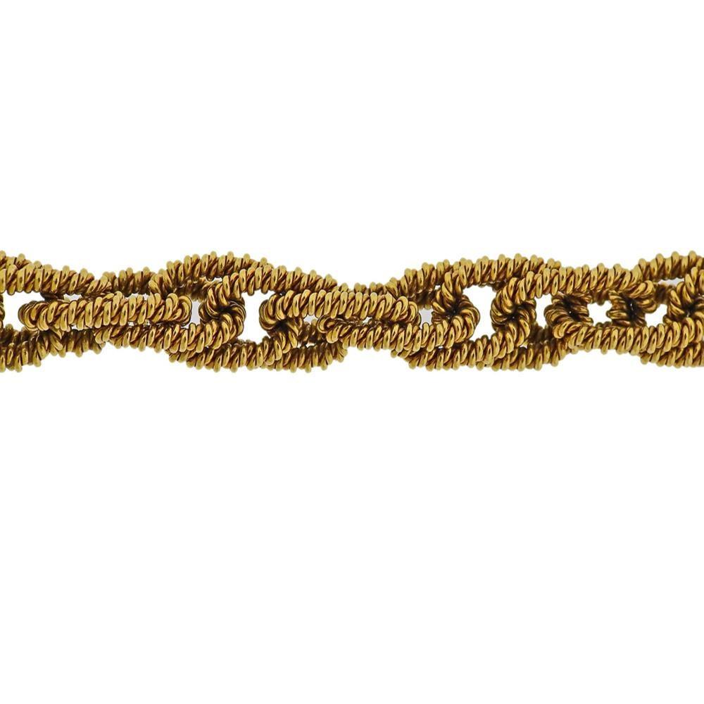 Vintage circa 1960s 18k gold woven link bracelet, measuring 8