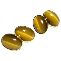 1960s Golden Cabochon Tiger's Eye Cufflinks, Mounted in 18 Carat Yellow Gold